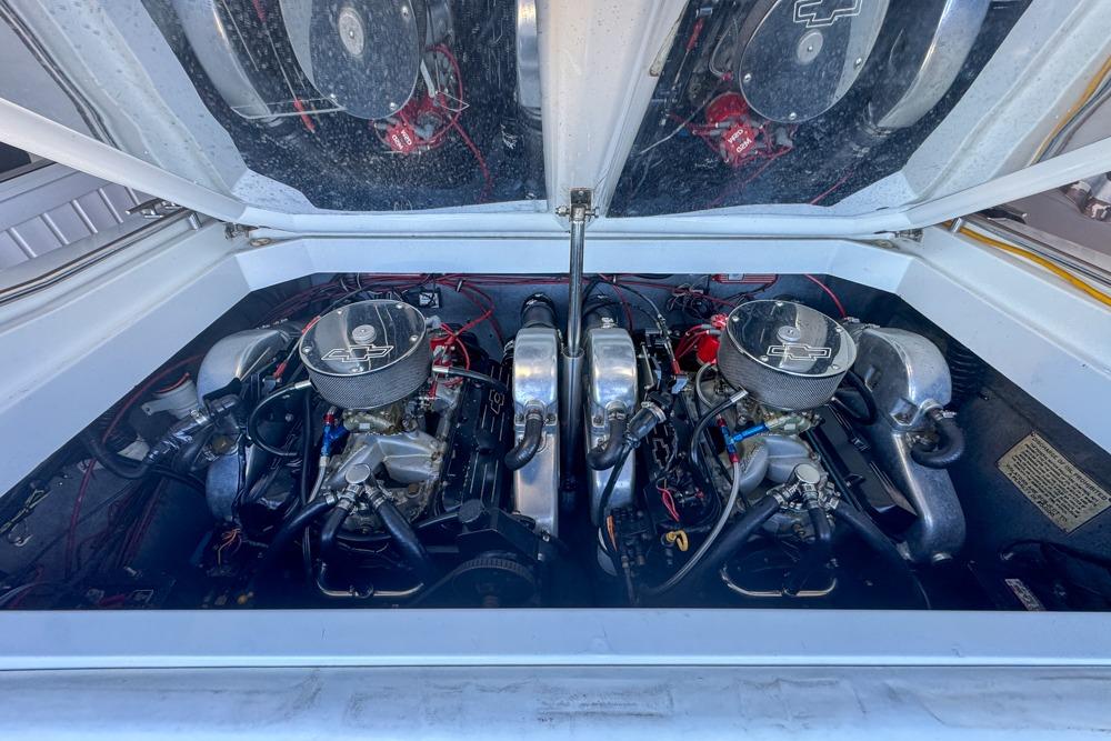 1989 Formula 292 SR-1 engine compartment with dual engines and chrome air filters.
