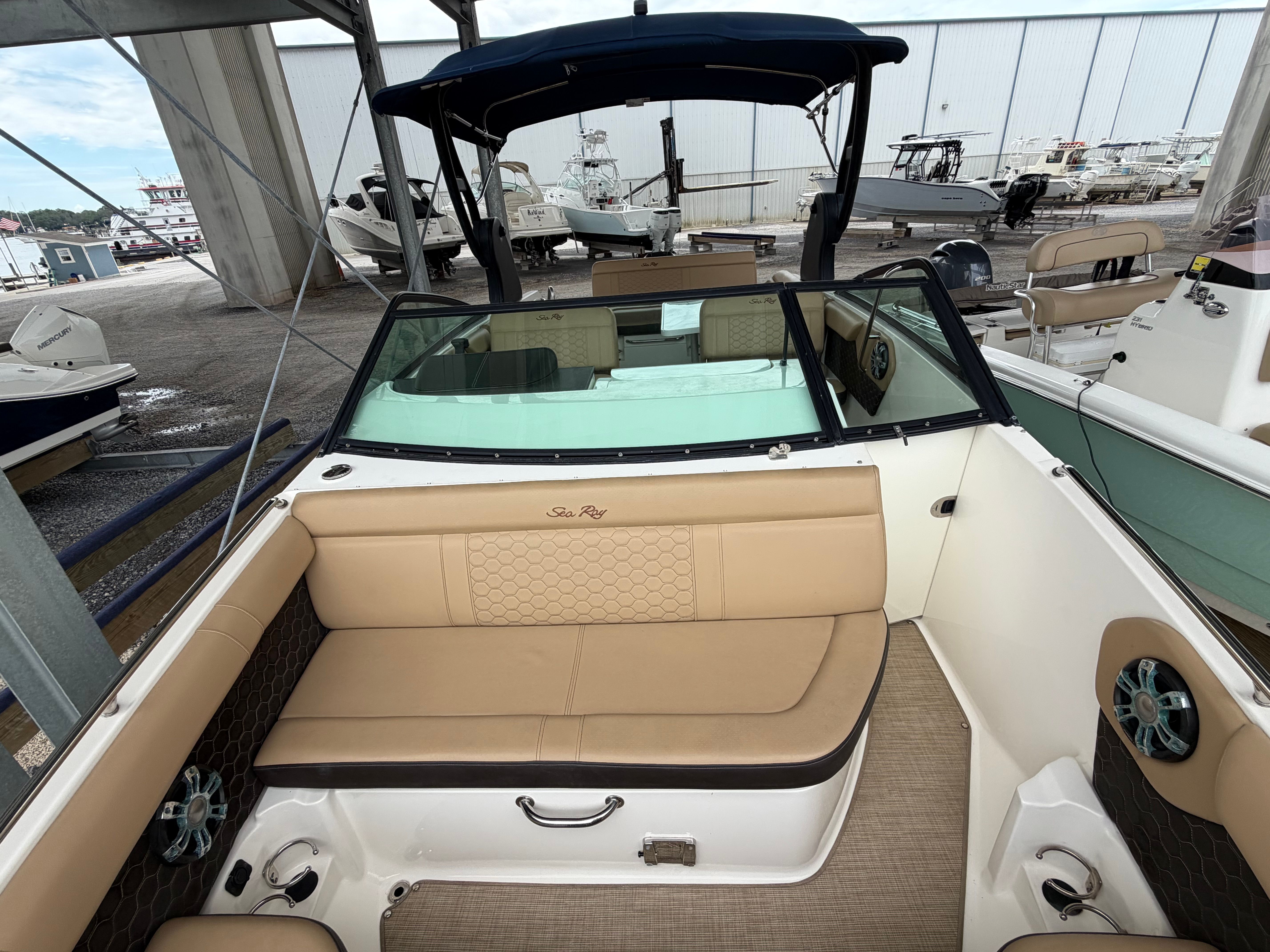 Interior of a 2020 Sea Ray SDX 250 Outboard boat at the marina.