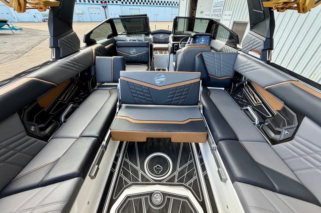 Luxurious interior of 2025 Tigé Ultré 25ZX boat with sleek seating and modern design.