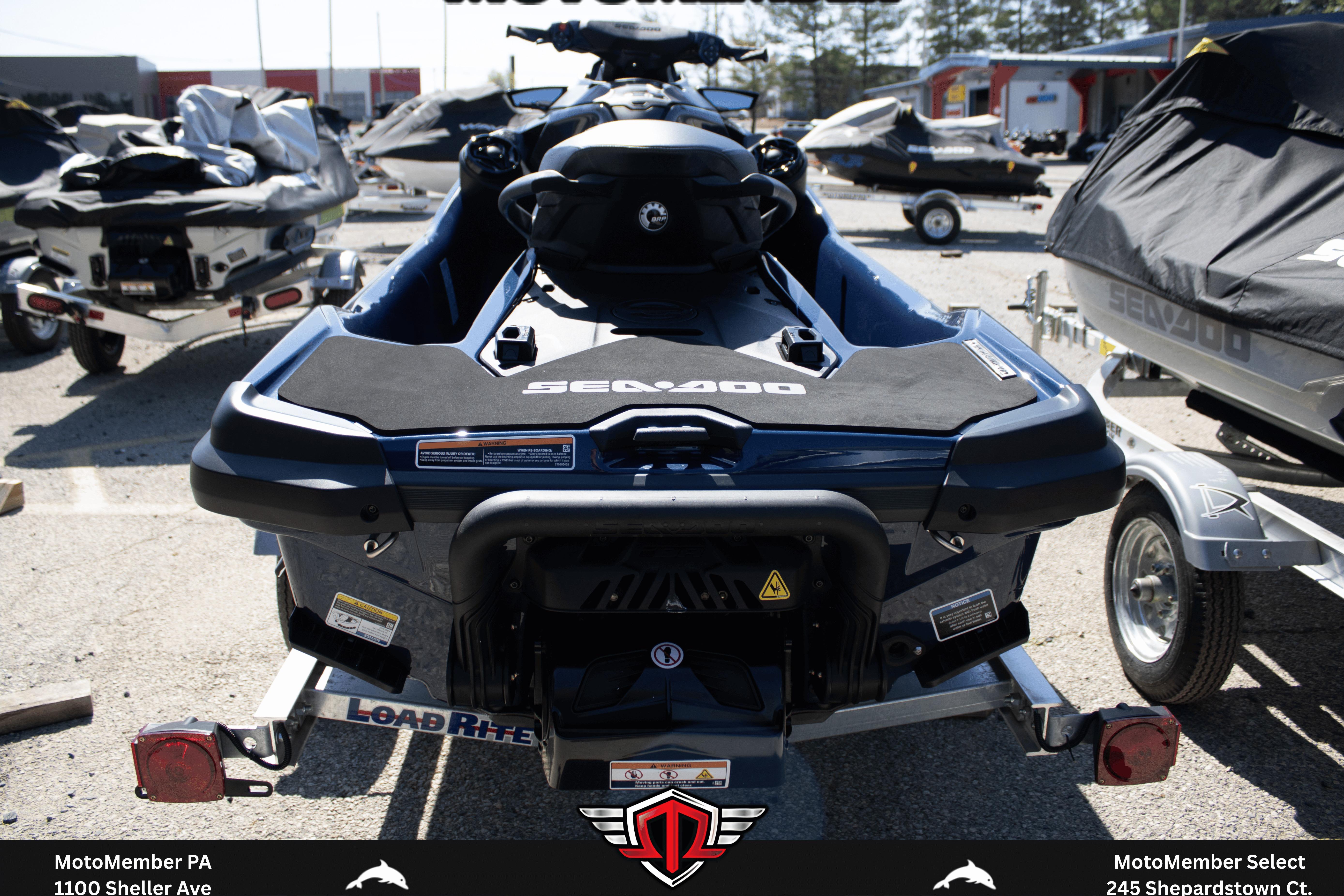 2026 Sea-Doo GTX 230 jet ski on trailer, rear view in outdoor setting.