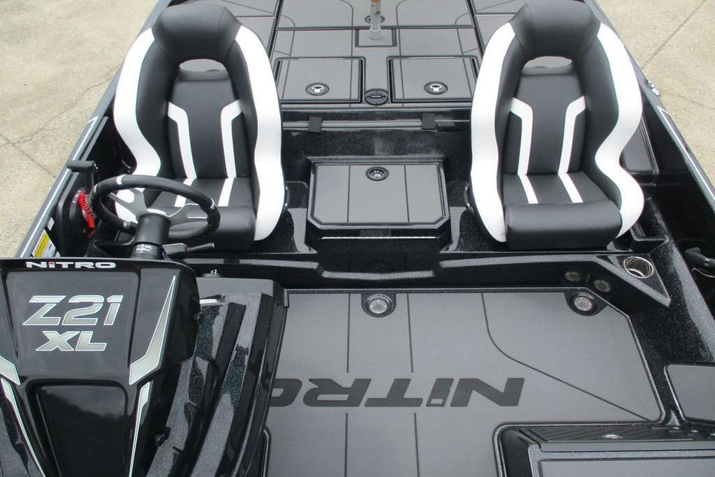 2026 Tracker Pro Guide V-16 WT boat interior with dual seats and steering console.