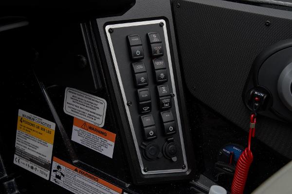 Manufacturer Provided Image: Control panel of 2025 Ranger Z519R Cup-Equipped with warning labels.