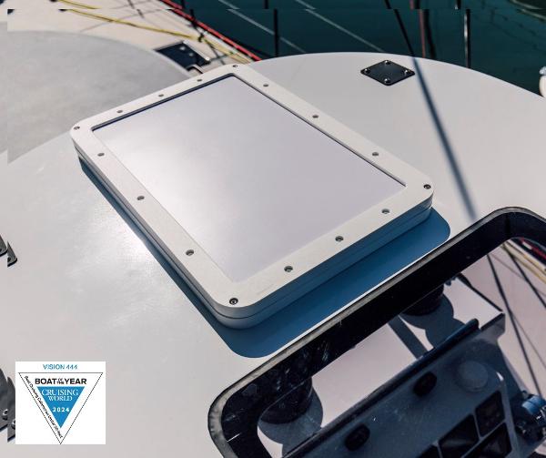 Alt text: Vision 444 sailboat deck with hatch, 2025 model, Boat of the Year award.