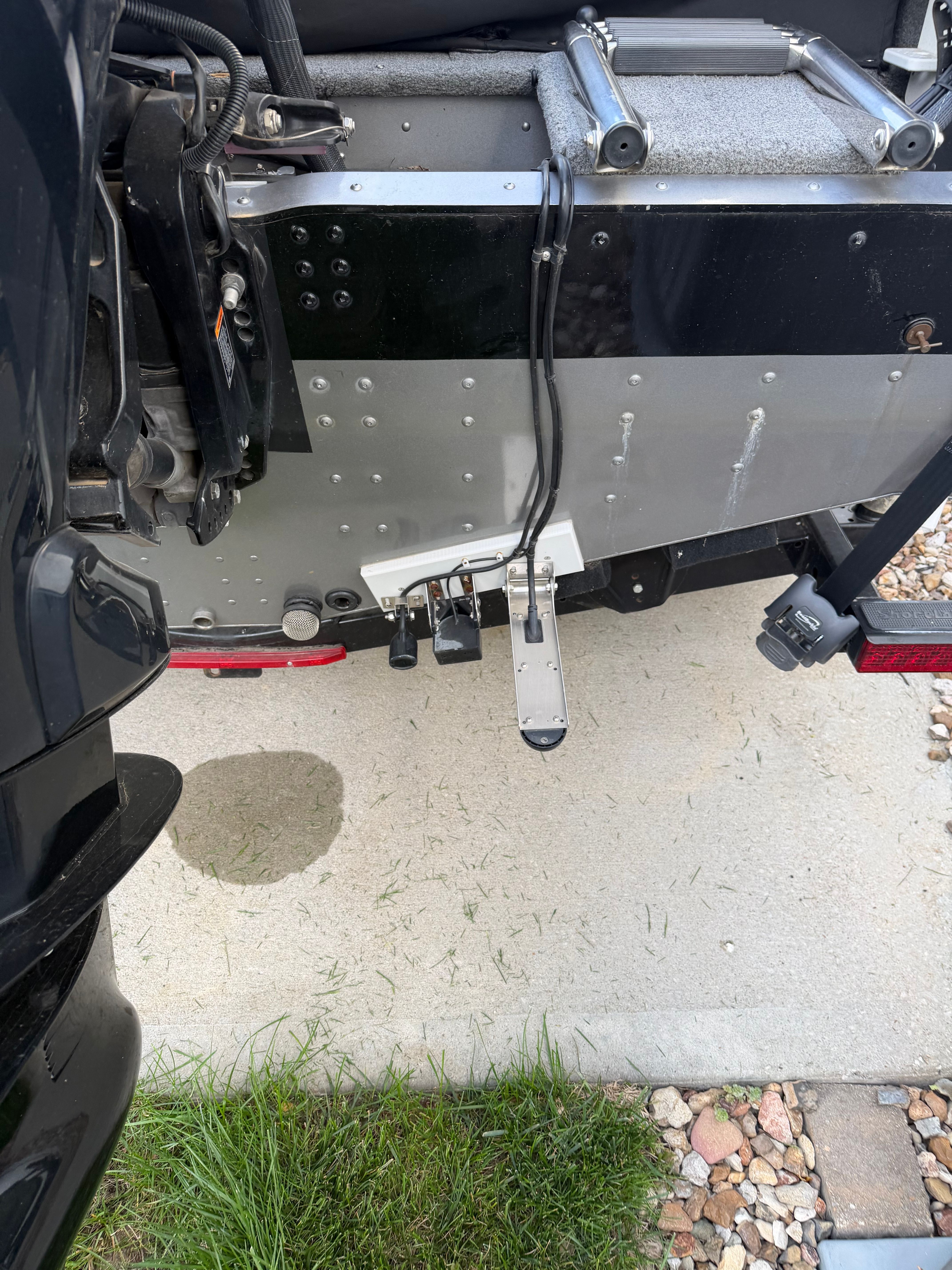 Rear view of a 2017 Lund Pro V 1975 boat with motor.