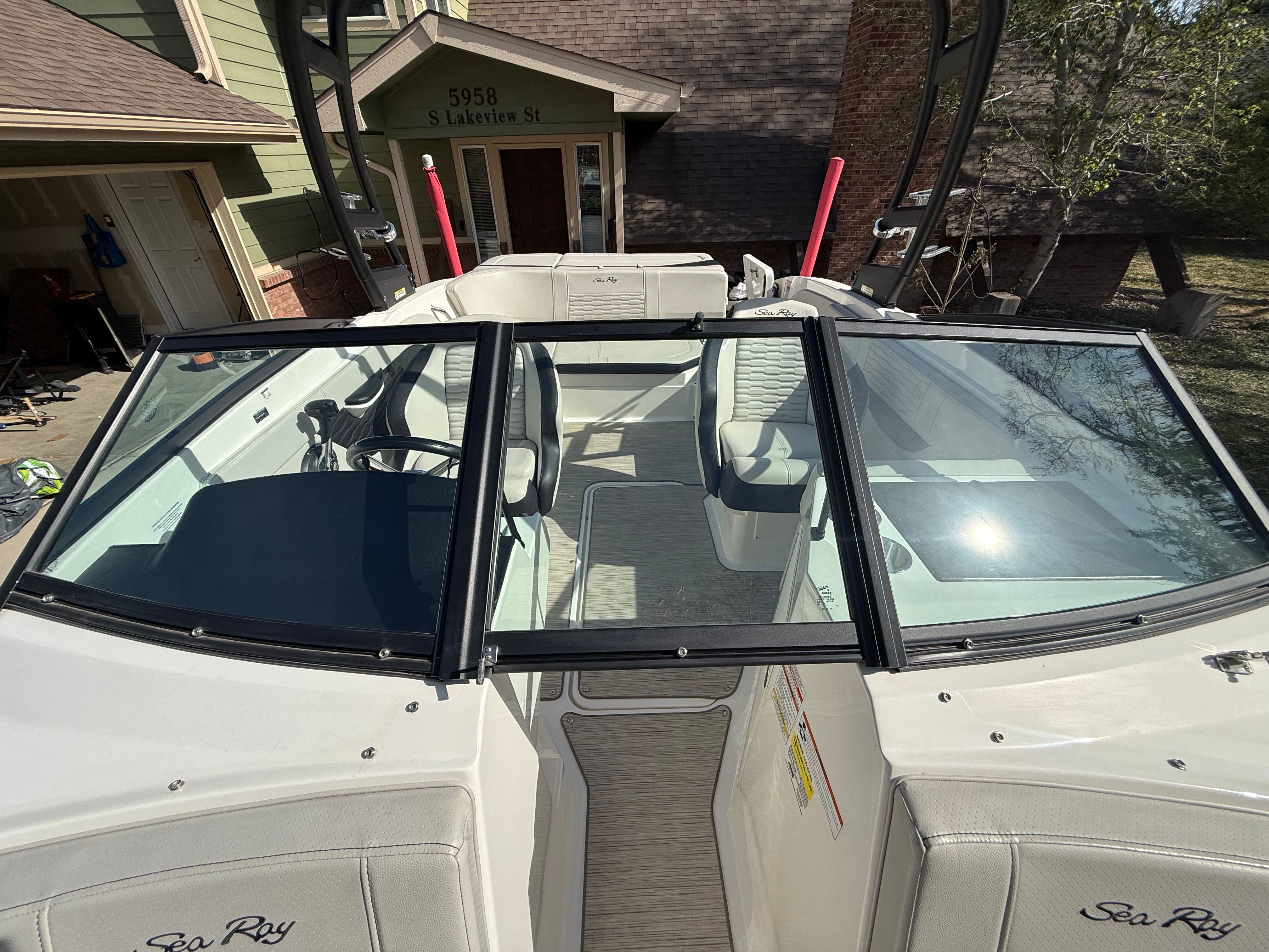 2022 Sea Ray SPX 210 boat parked outdoors.