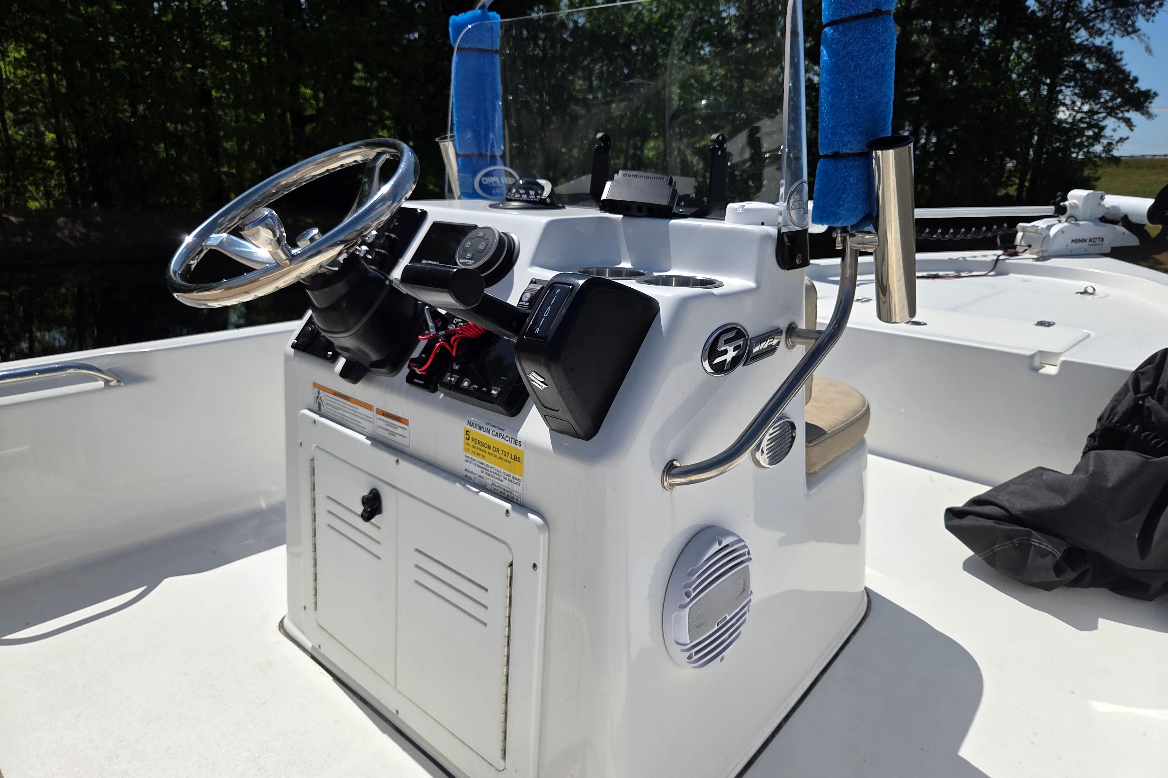 2024 Sea Pro 172 Bay boat console with steering wheel and controls.