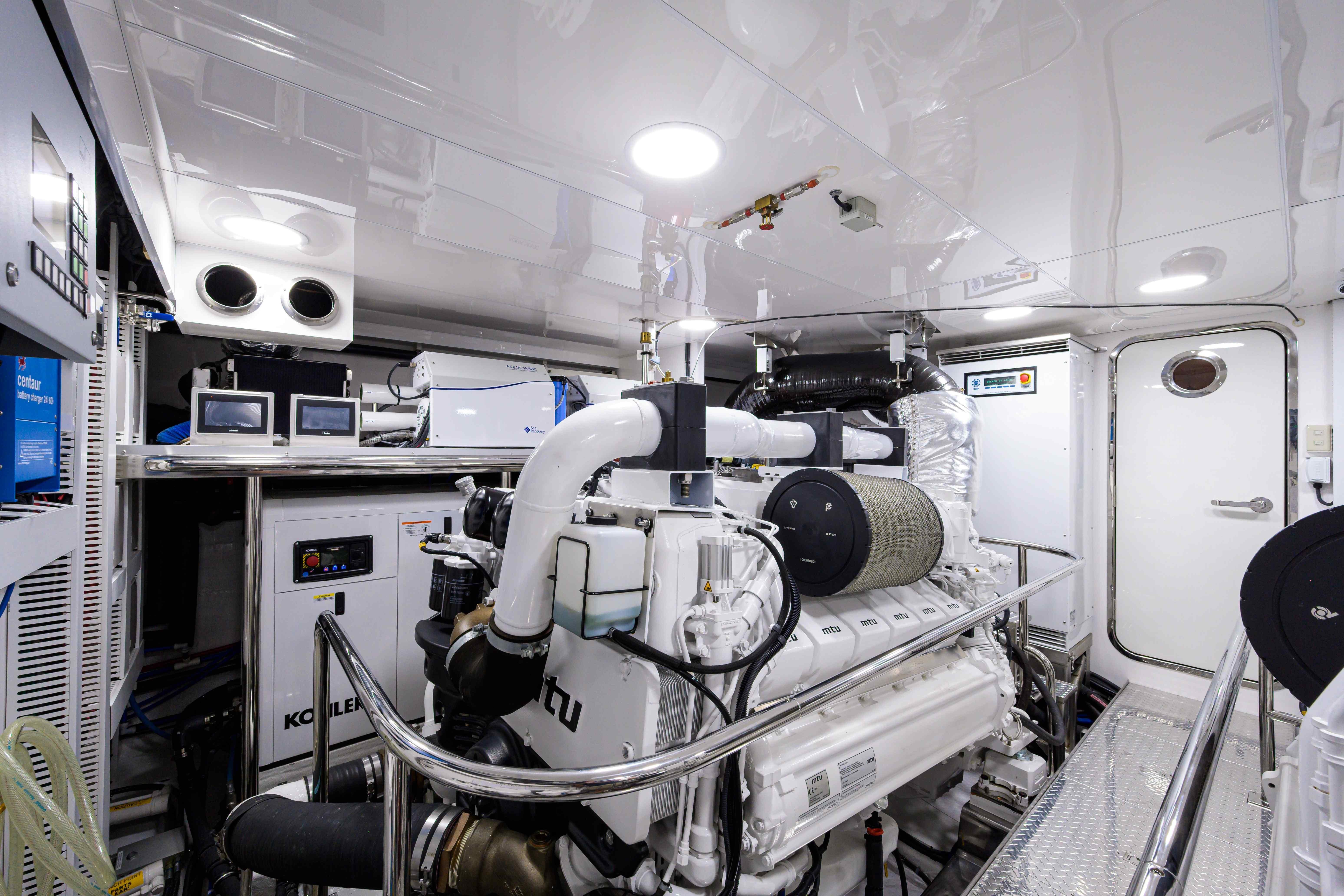 Engine room of 2019 Ocean Alexander 100 Motoryacht, featuring advanced machinery and equipment.