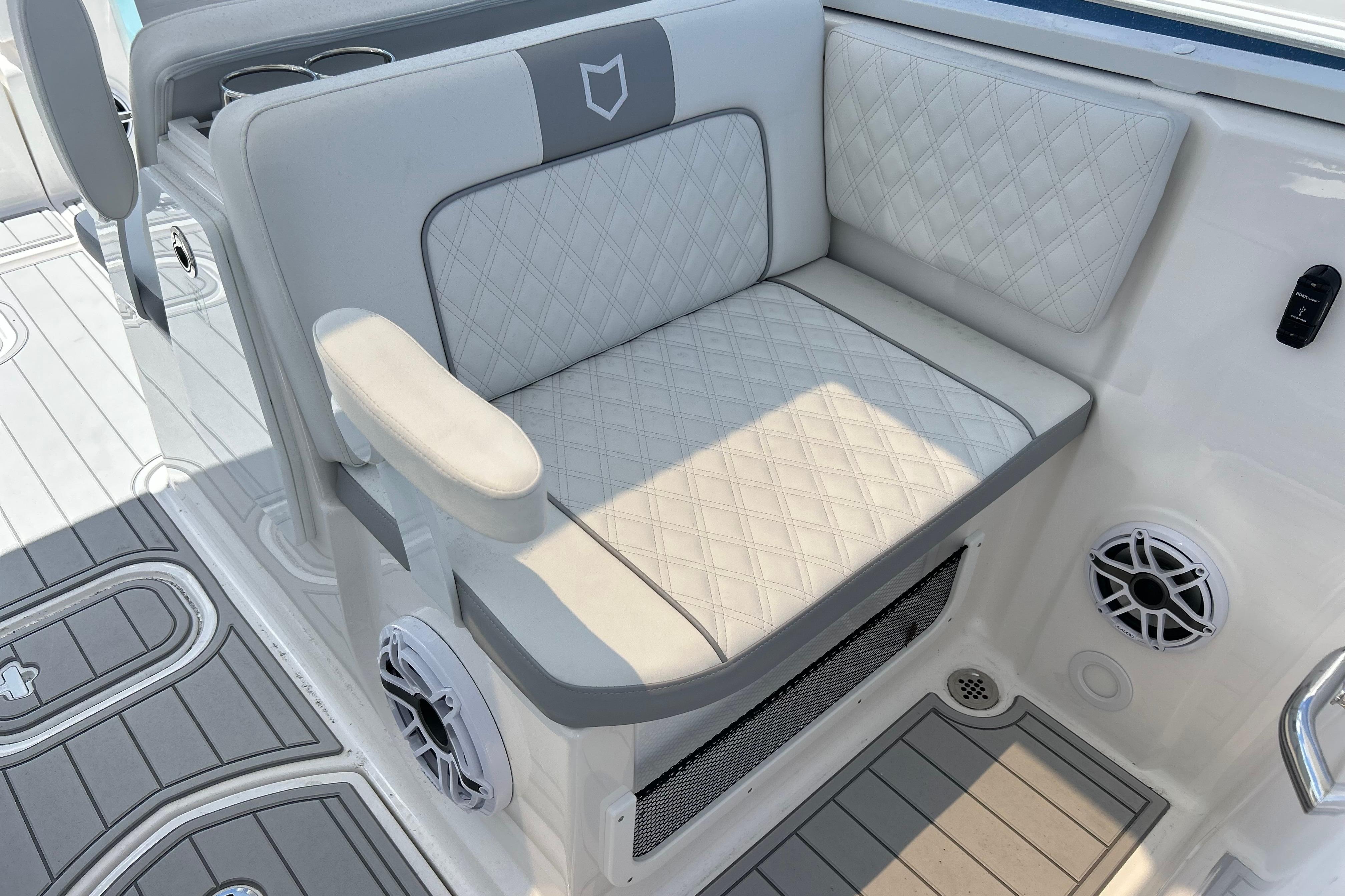 2026 Sea Fox 288 Traveler boat seat with quilted upholstery and integrated speakers.