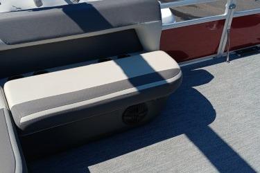 2026 Sun Tracker Bass Buggy 16 XL Select boat interior with cushioned seating and carpeted flooring.