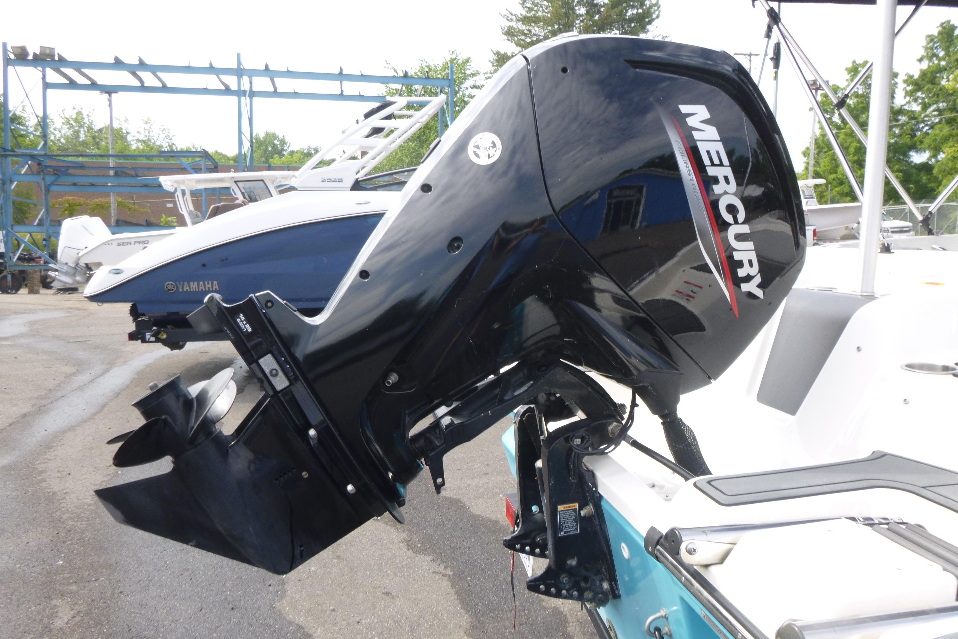 2022 Bayliner Element M17 with Mercury outboard motor in a marina setting.