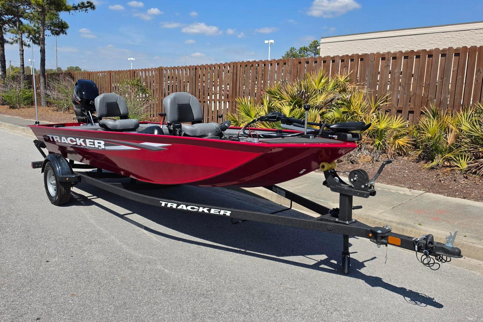 2026 Tracker Panfish 17 boat on trailer, parked outdoors, sunny day.