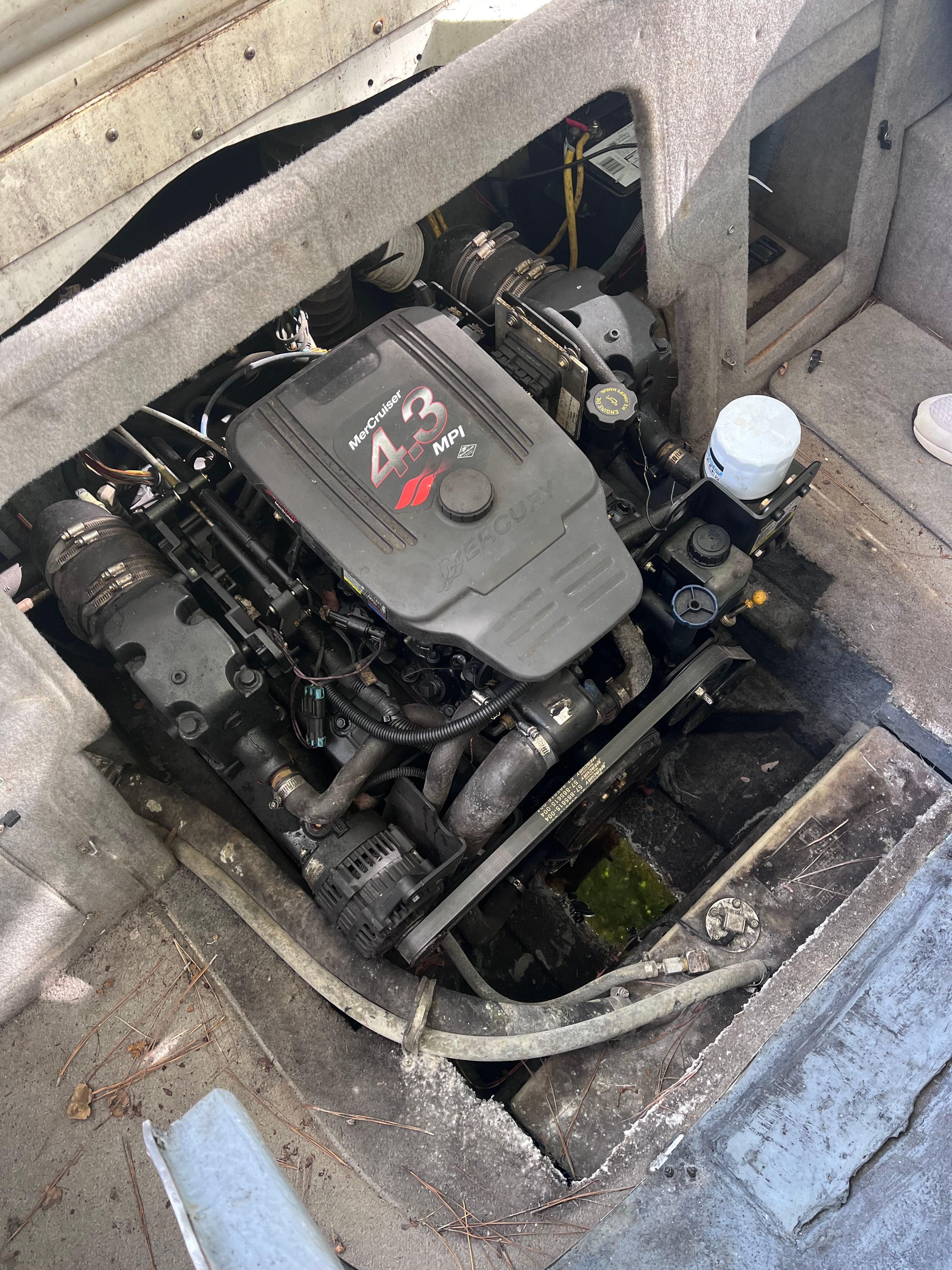 Engine compartment of a 2005 Bayliner Cuddy Capri boat with 4.3 MPI engine.