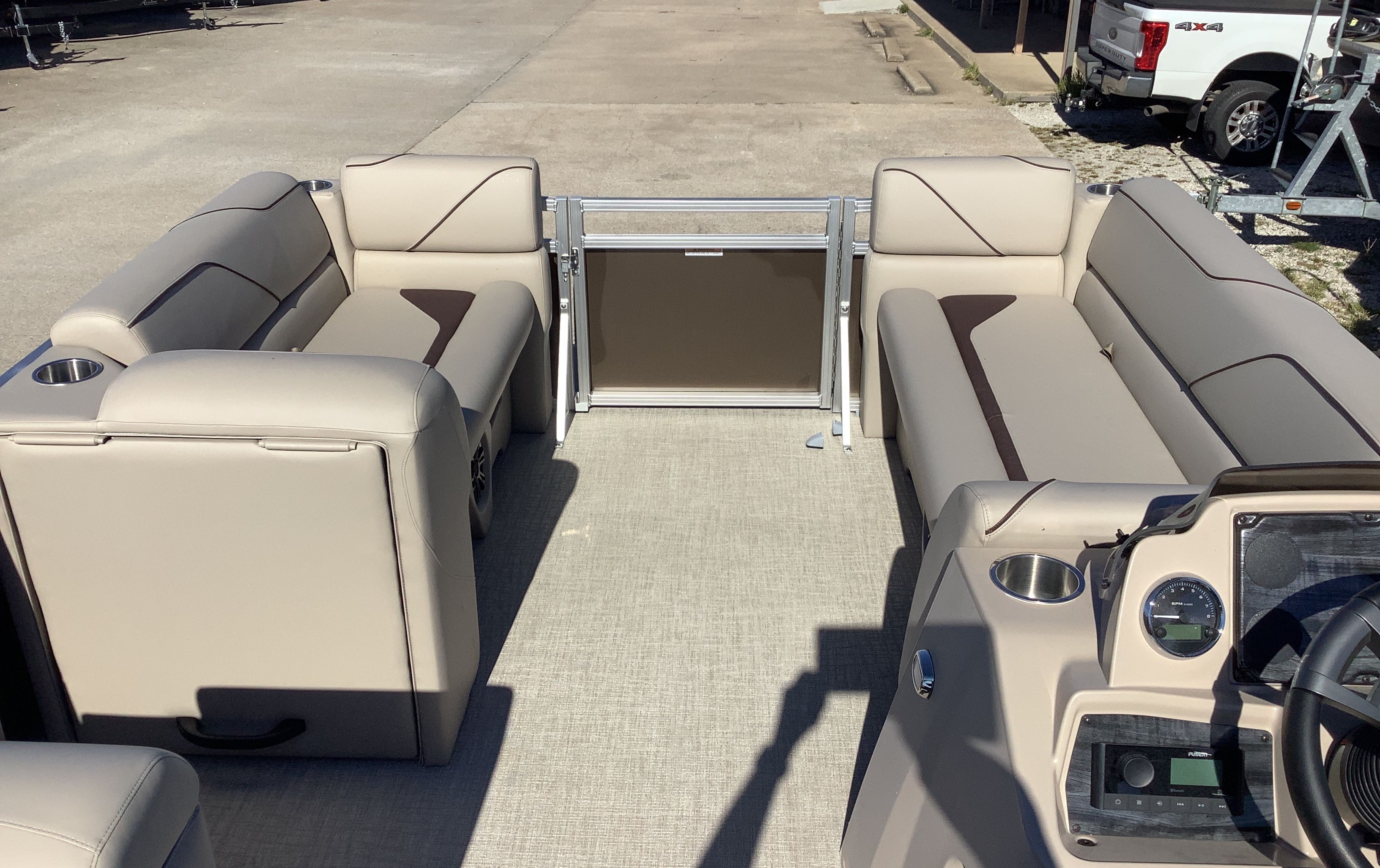 Interior of 2026 Tahoe 1980 Sport Cruise with rear bench seating.