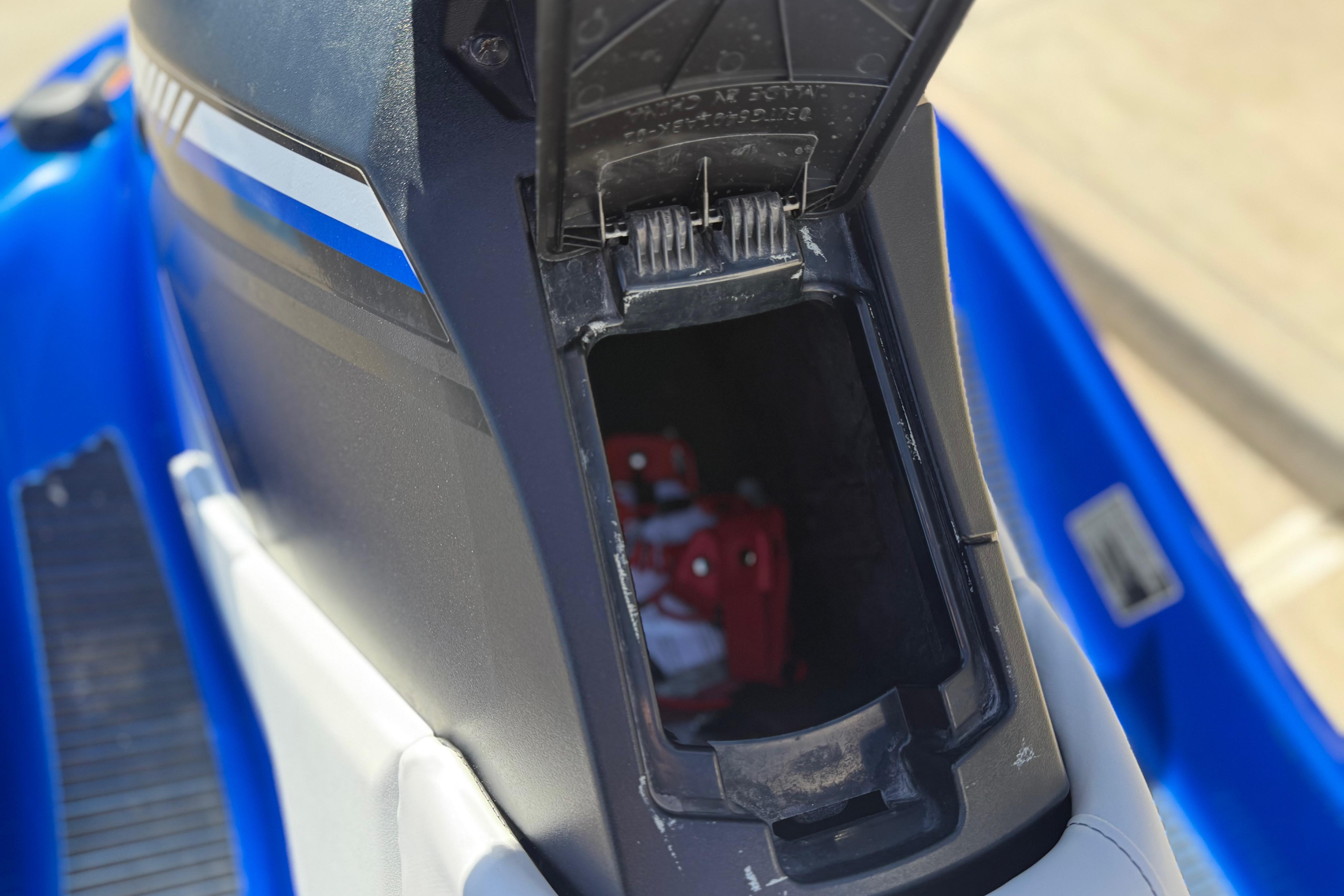 Open storage compartment of 2017 Yamaha WaveRunner EX Deluxe jet ski.