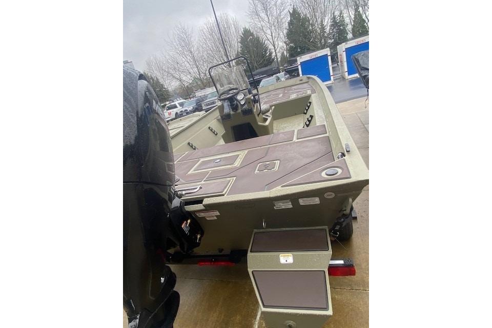 2026 Tracker Grizzly 2072 CC boat with spacious deck and modern design.
