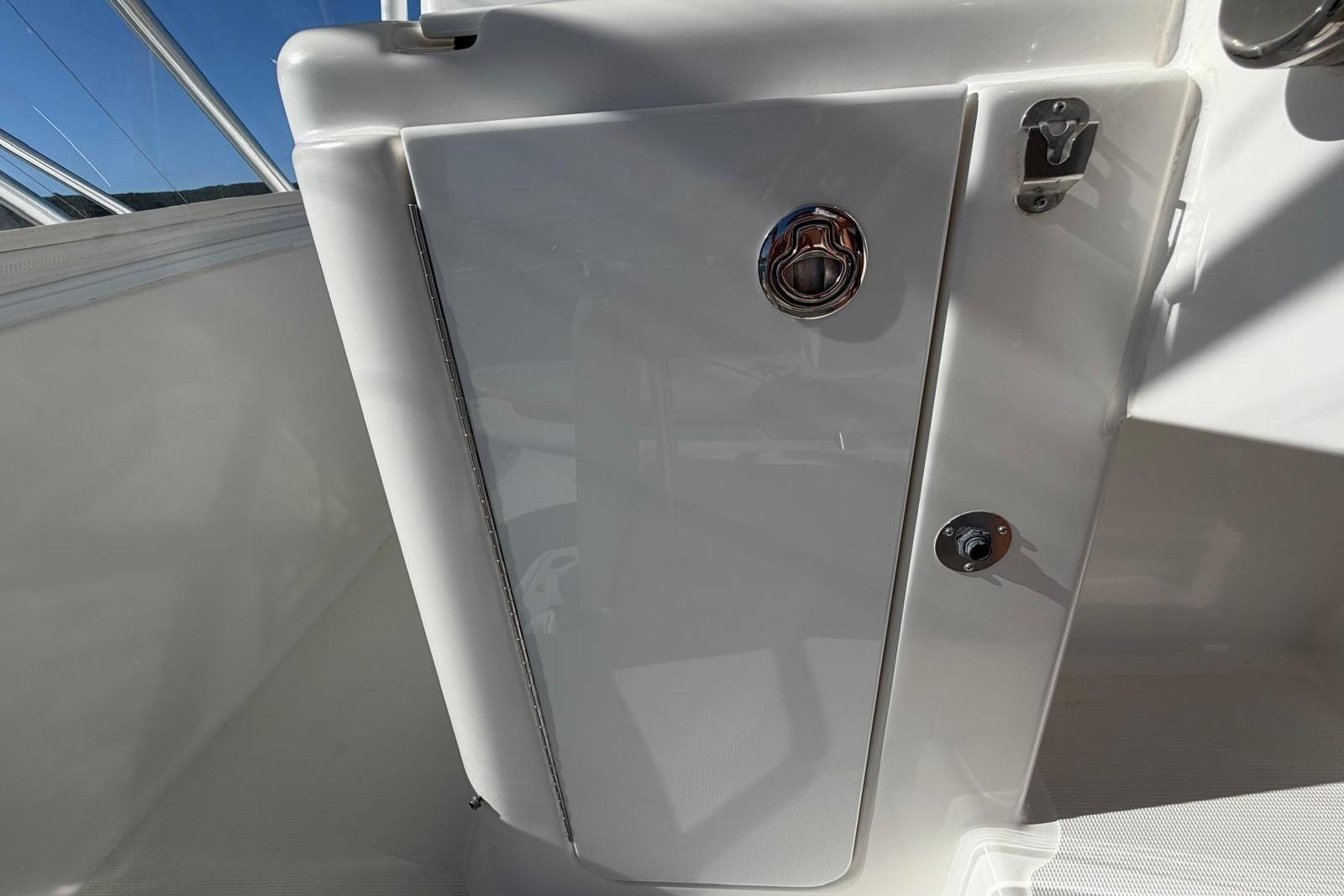 2007 Tiara Yachts 3900 Convertible, sleek white exterior detail with chrome accents.