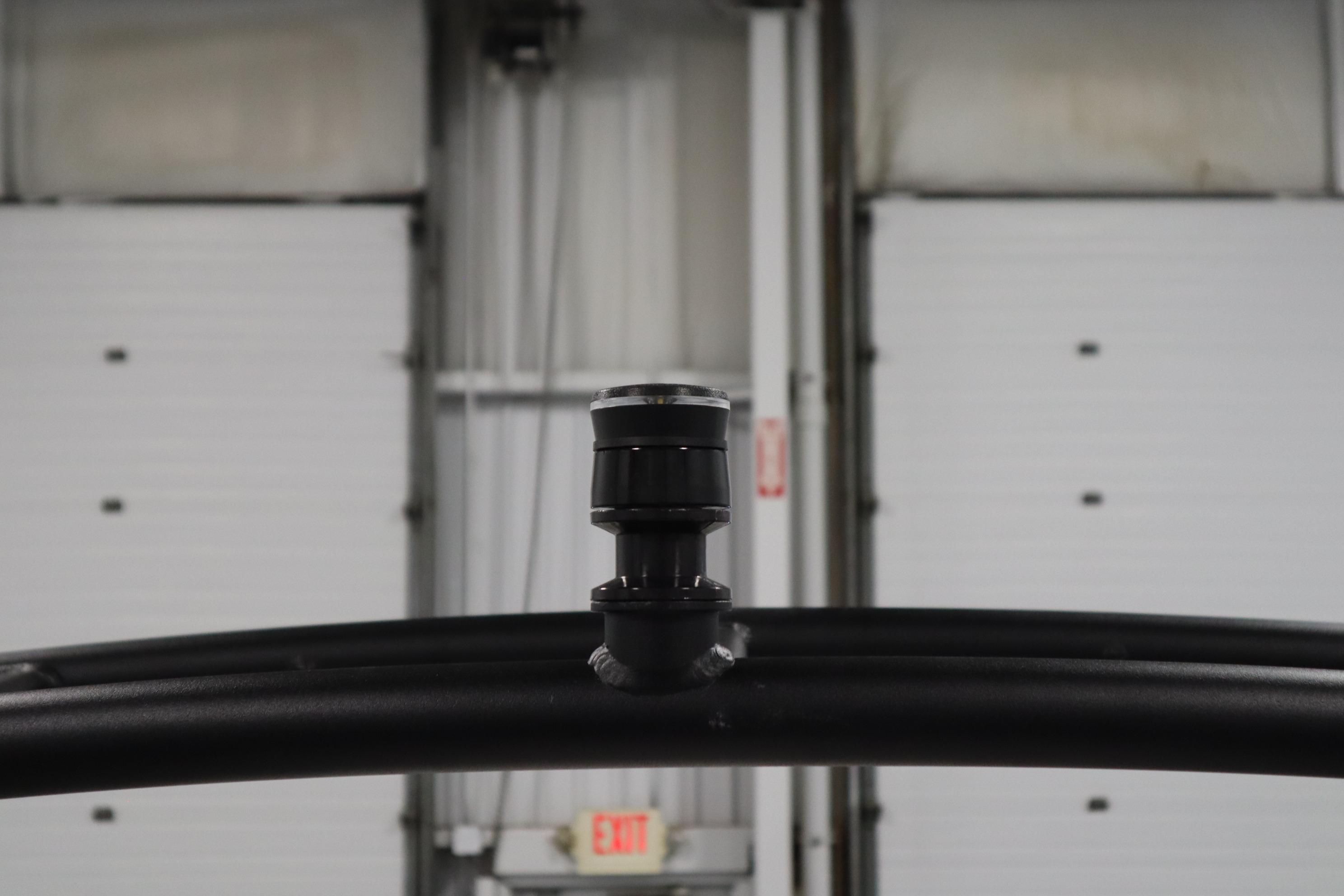 Close-up of 2026 Yamaha AR250 boat component in a garage setting.