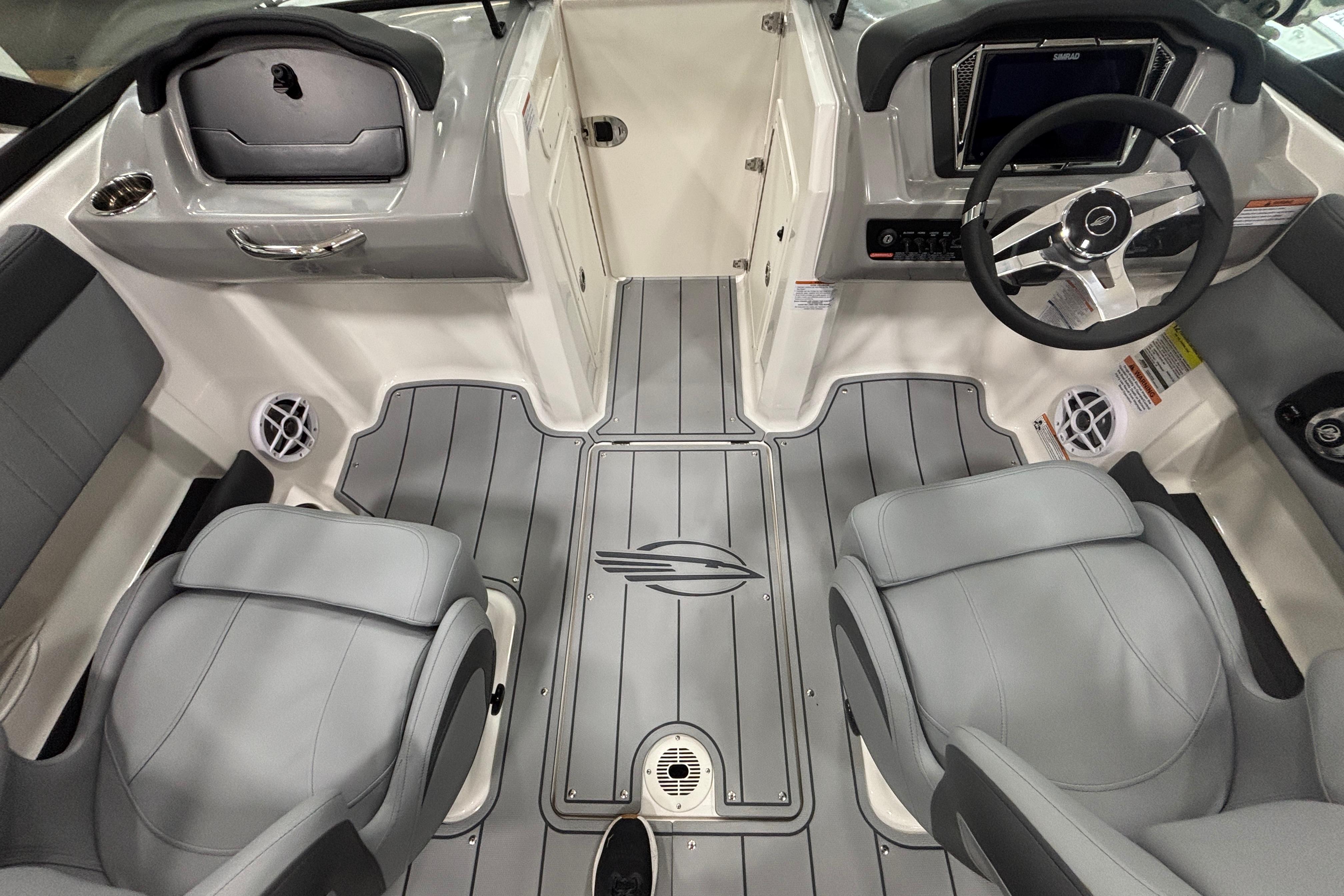 Interior of 2026 Chaparral 21 SSi with gray seats and steering wheel.
