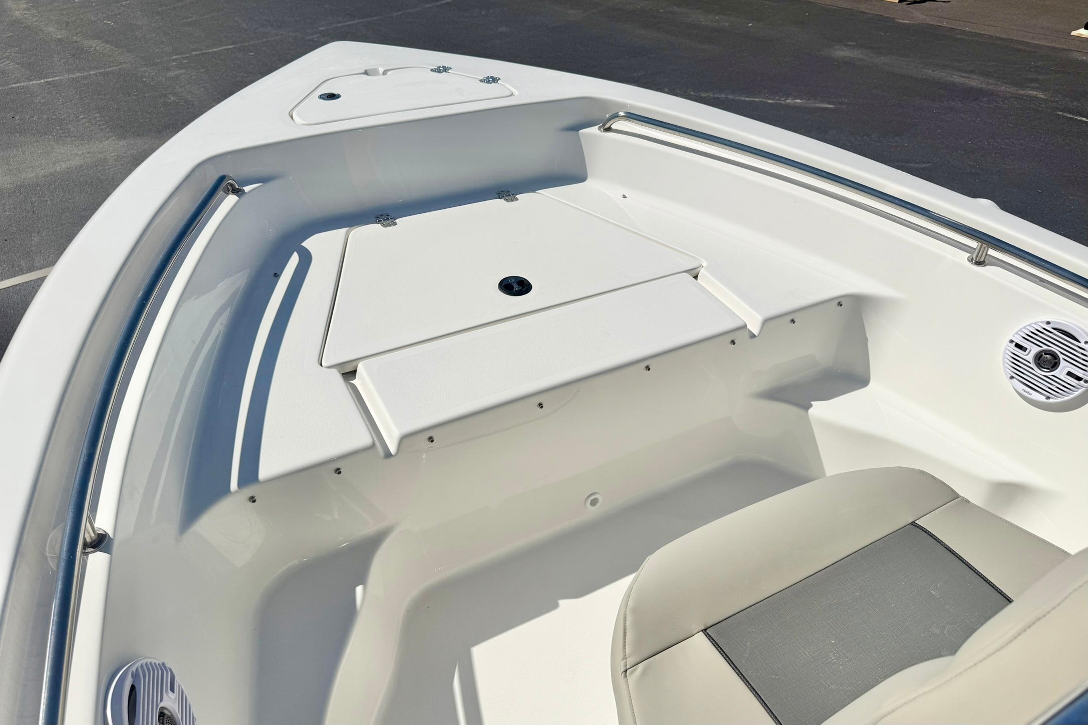 2026 Key West 189 FS boat interior, featuring sleek seating and storage compartments.