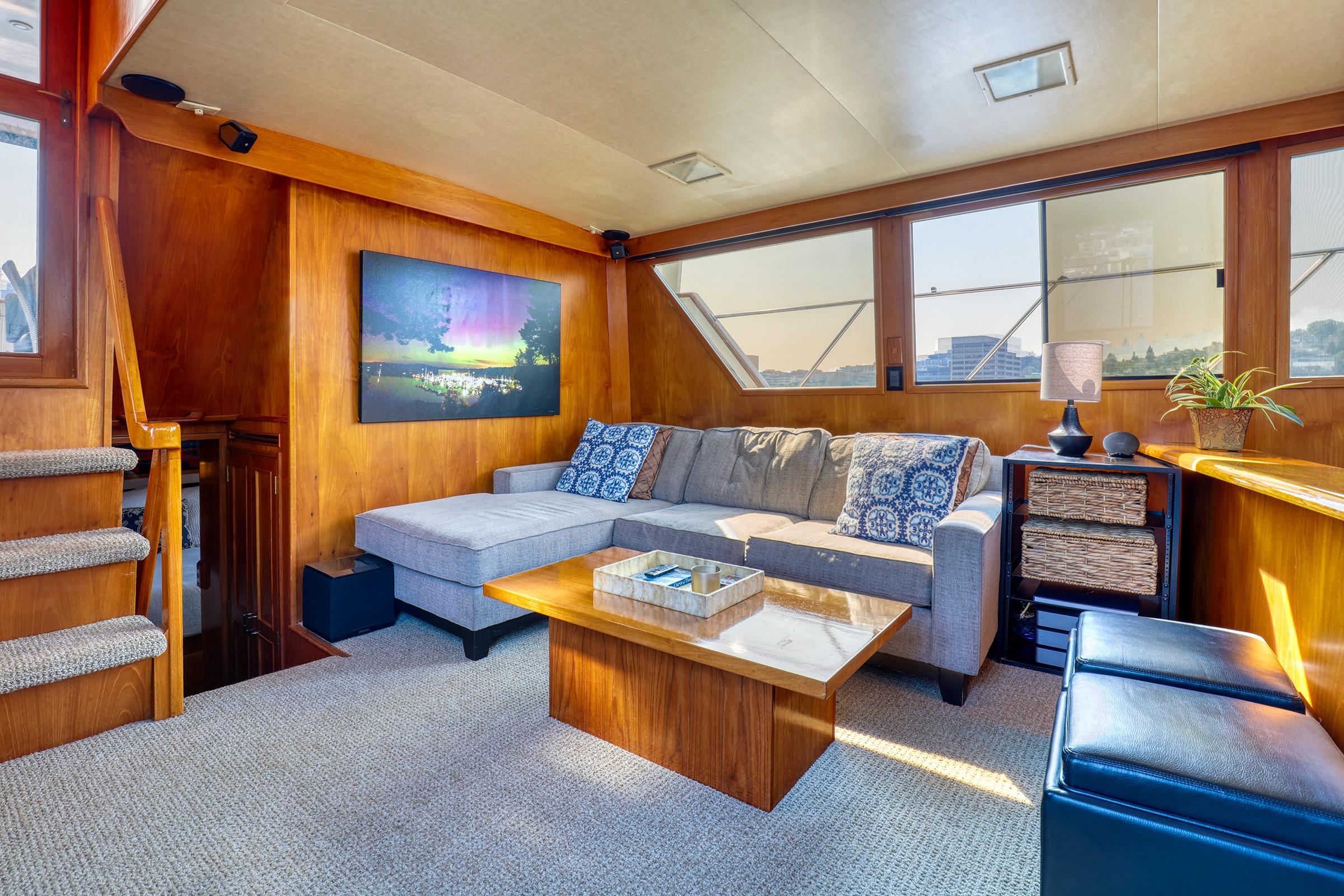 Luxurious 1987 Ocean Alexander 480 Sport Sedan interior with cozy seating and elegant decor.