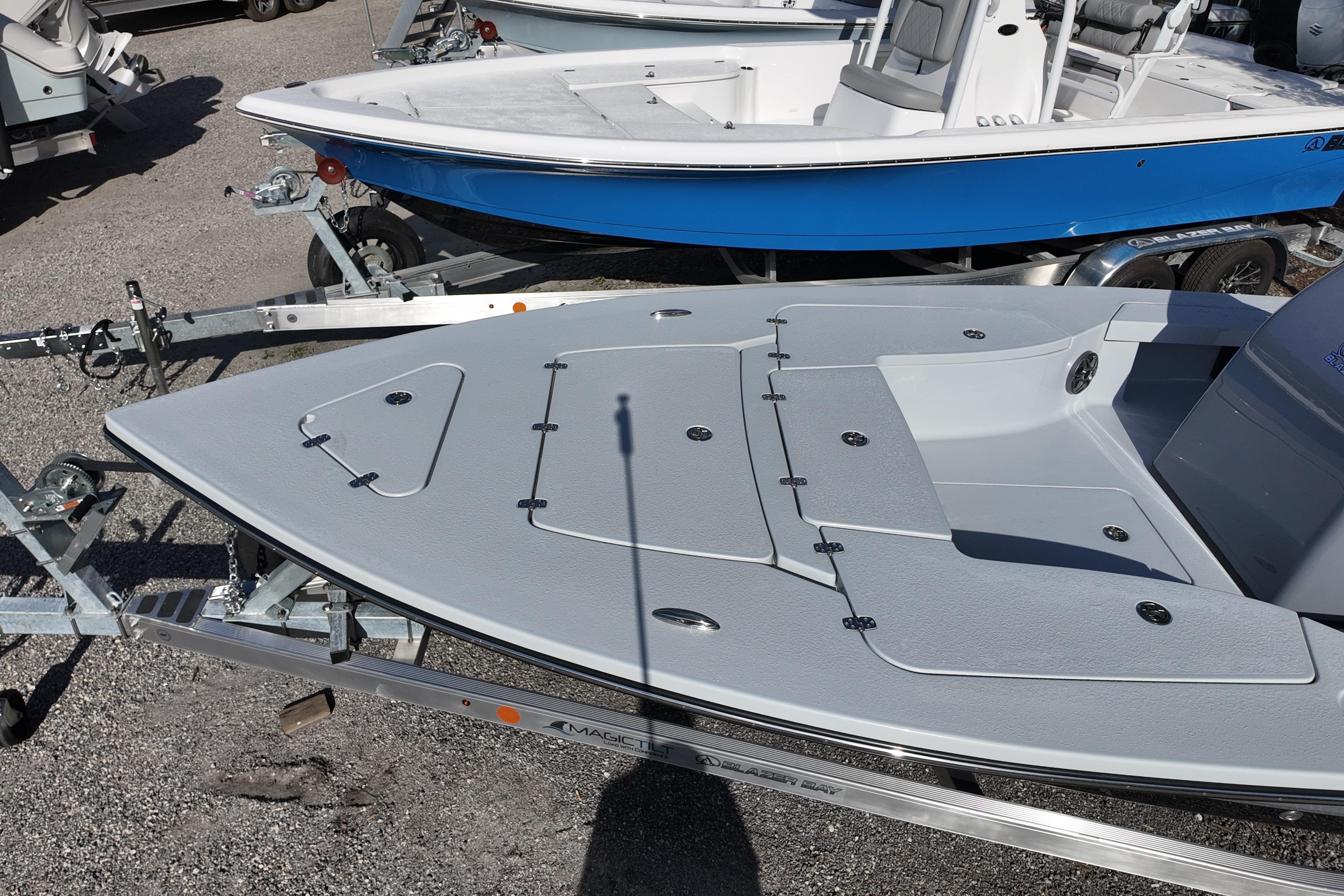 2026 Blazer Bay 675 Ultimate Bay boat on trailer, showcasing sleek design and spacious deck.