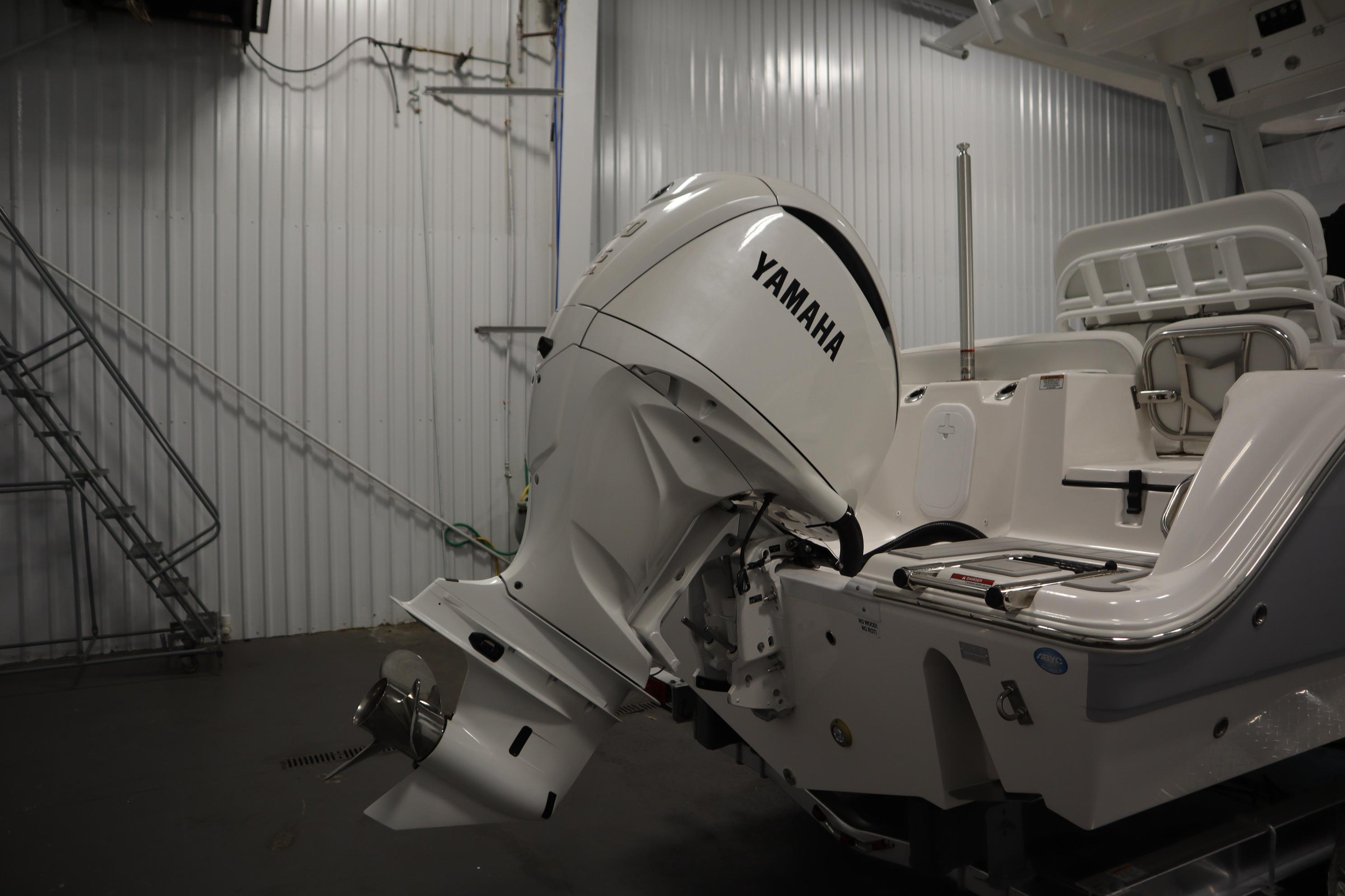 2026 Sea Fox 228 Commander with Yamaha outboard motor in a garage setting.