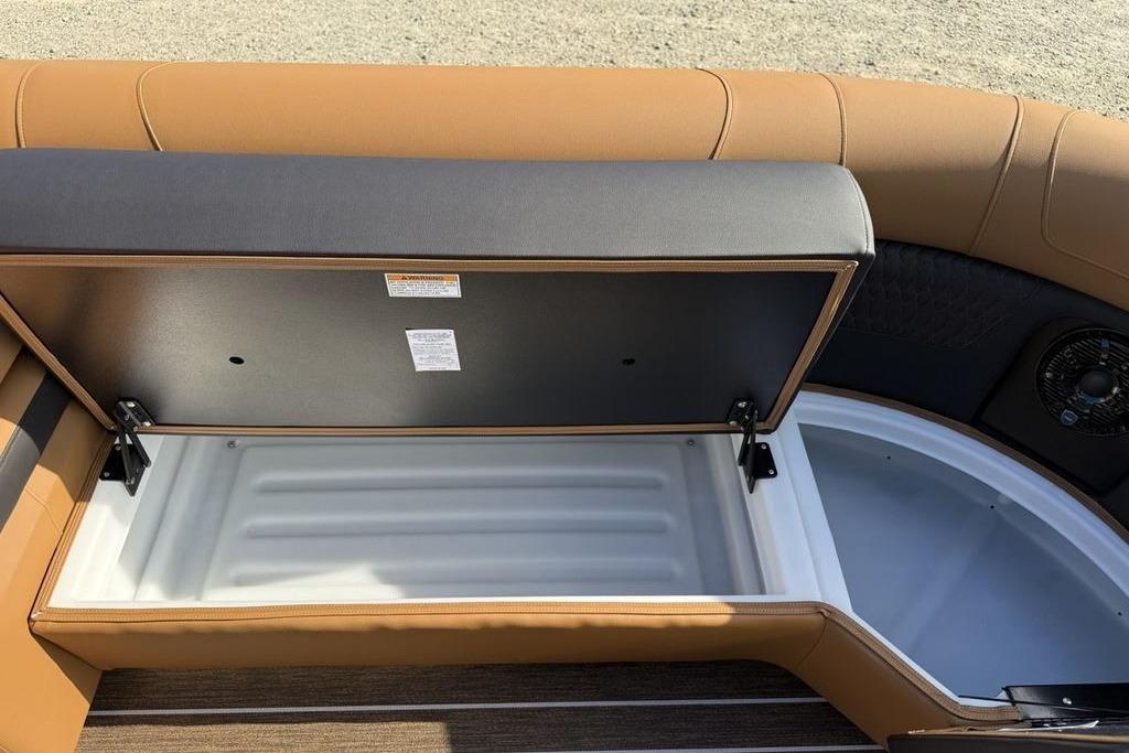 Open storage compartment in 2026 Premier 250 Solaris RS CL boat.