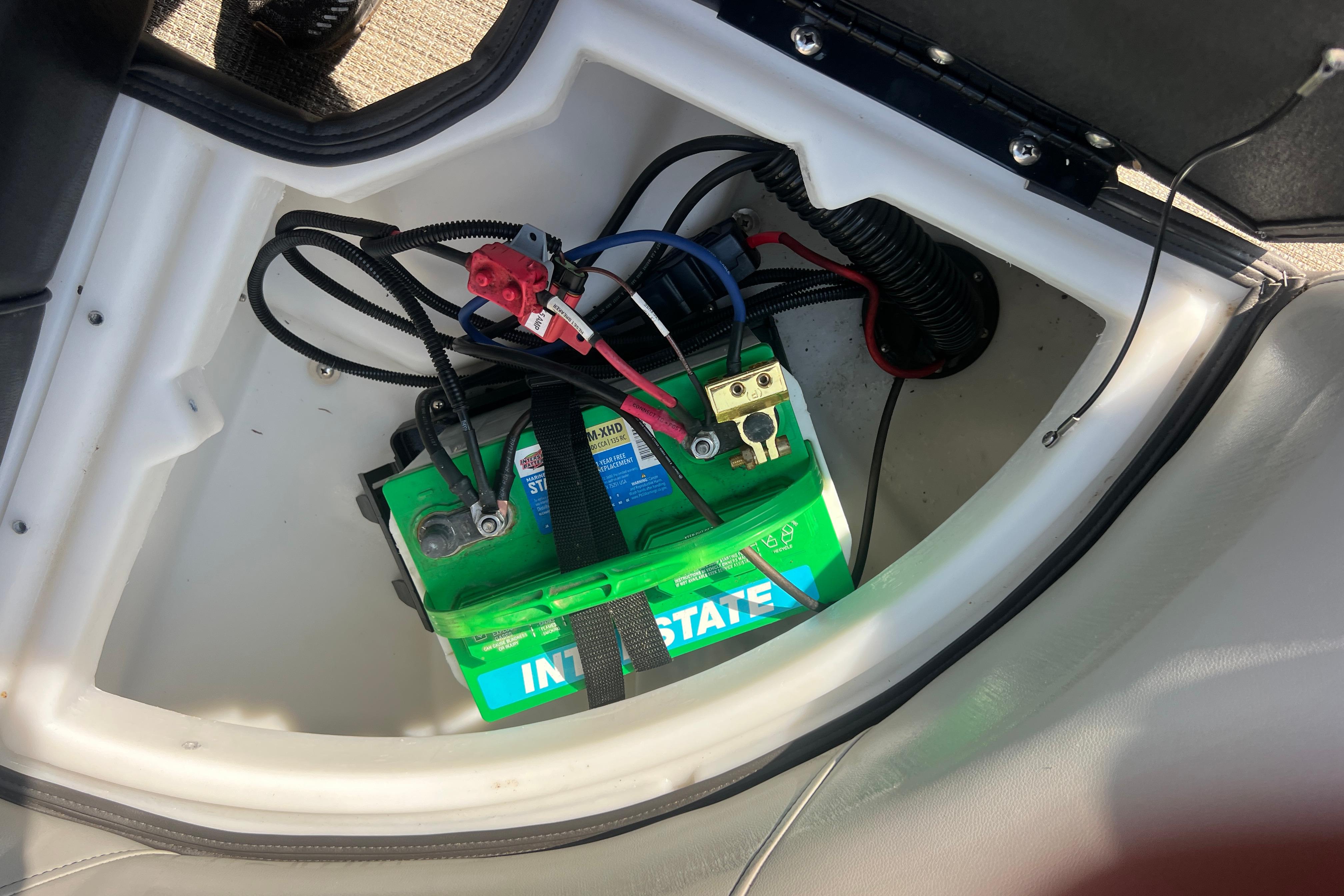 Battery compartment of 2022 Viaggio Lago V-U 22 with Interstate battery installed.
