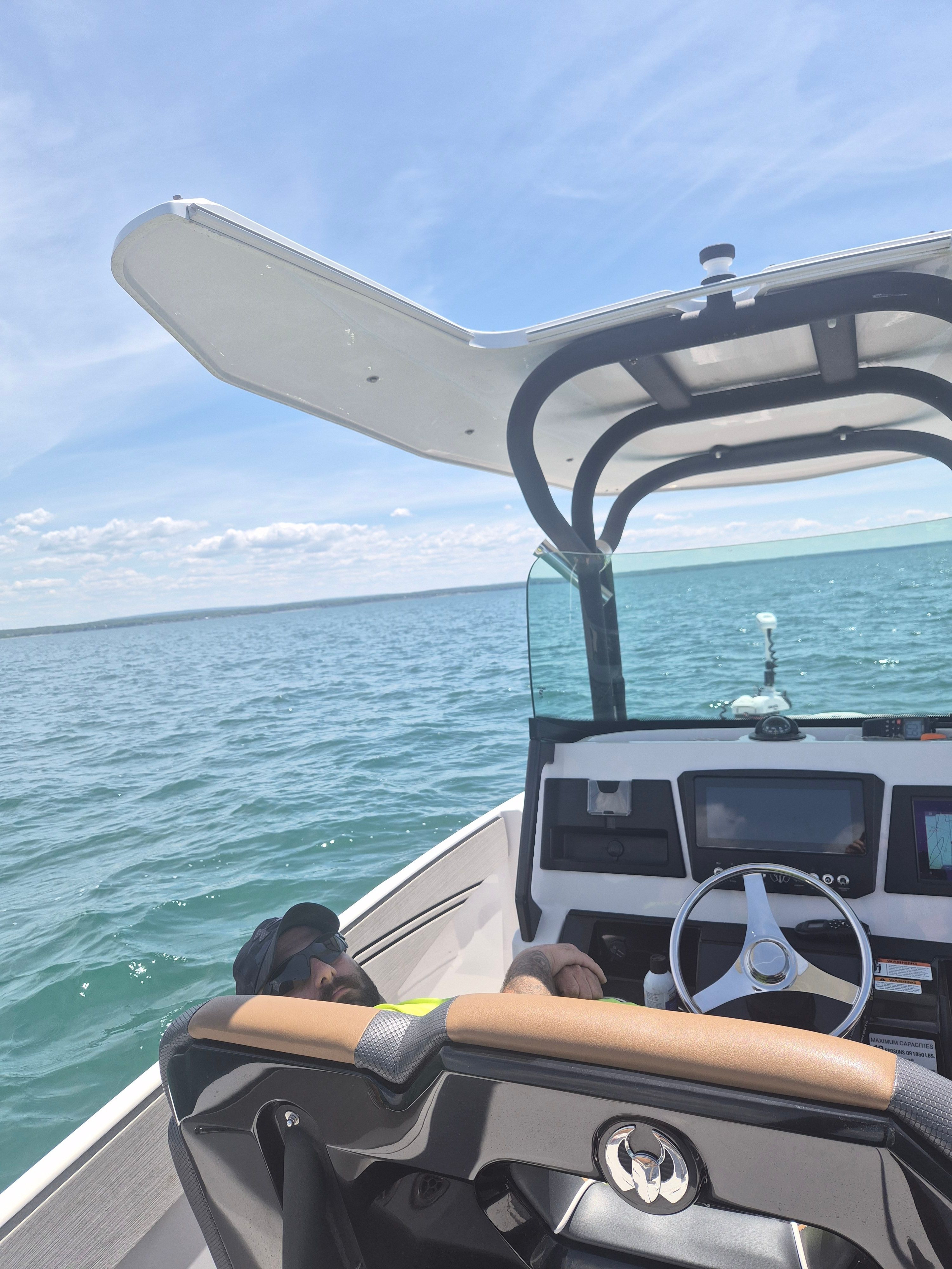 Scarab 255 Open ID boat on open water, 2019 model.