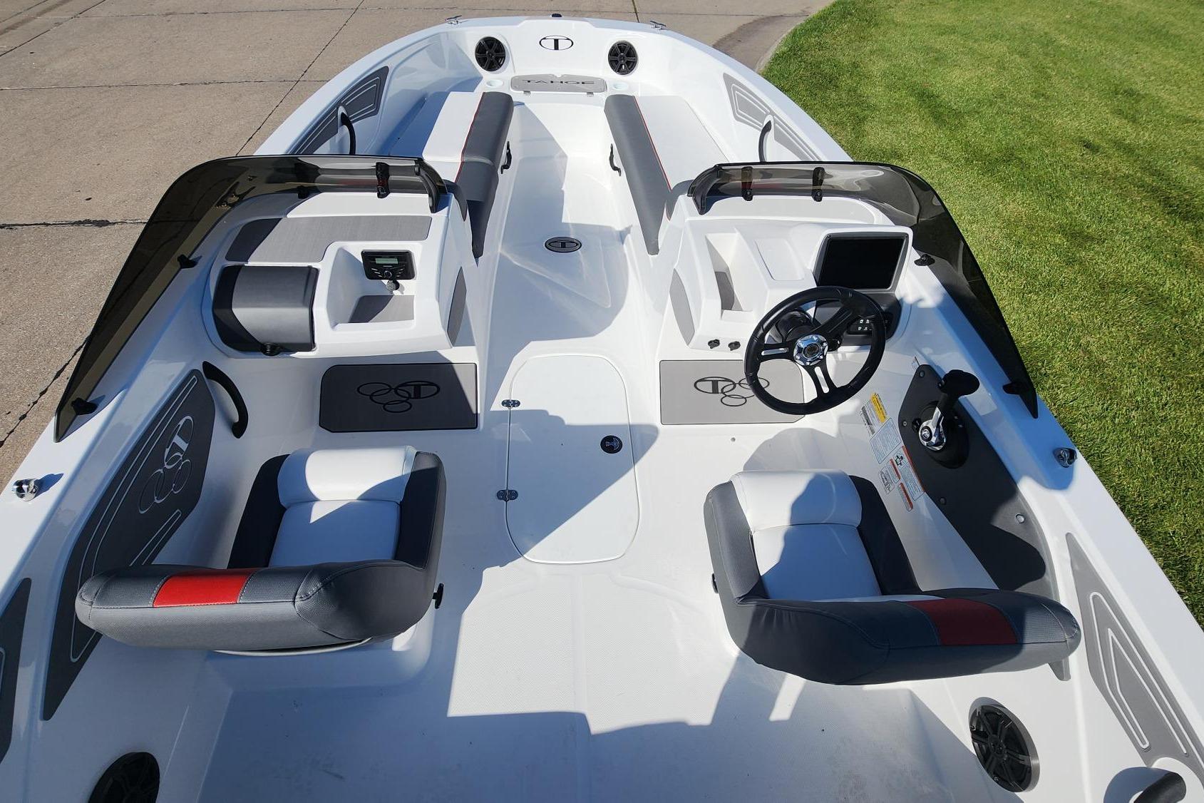 2026 Tahoe T21 boat interior with modern seating and steering wheel design.