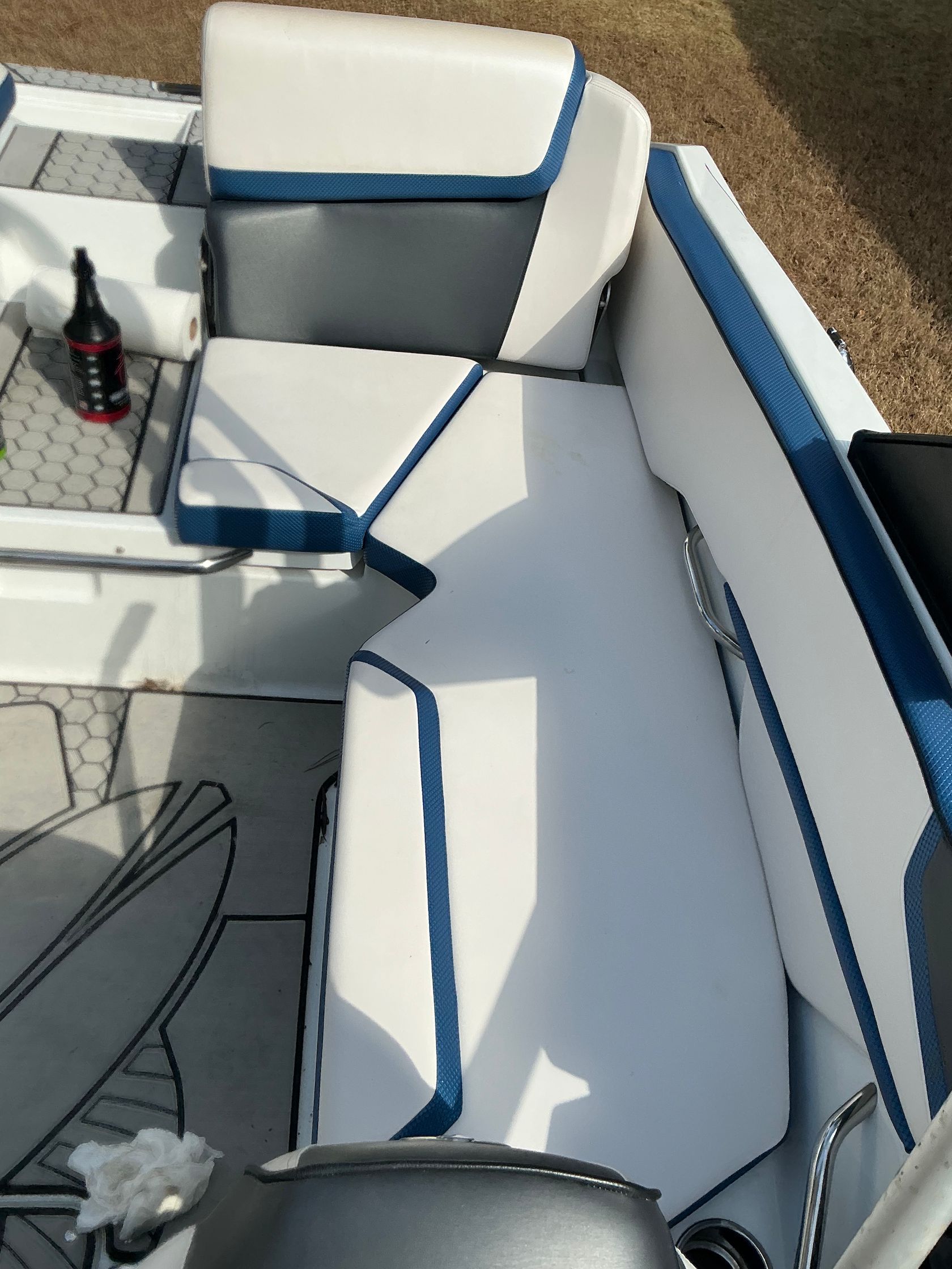 Interior of a 2021 Scarab 215 ID boat with blue accents.