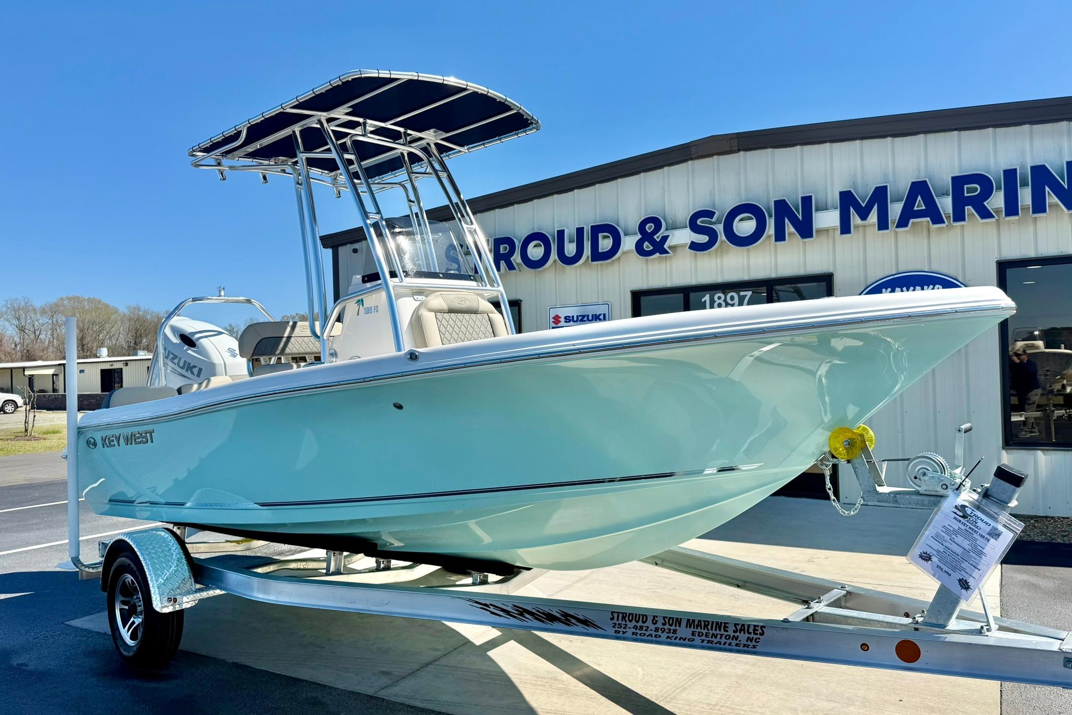 2026 Key West 189 FS boat on trailer at marine dealership.