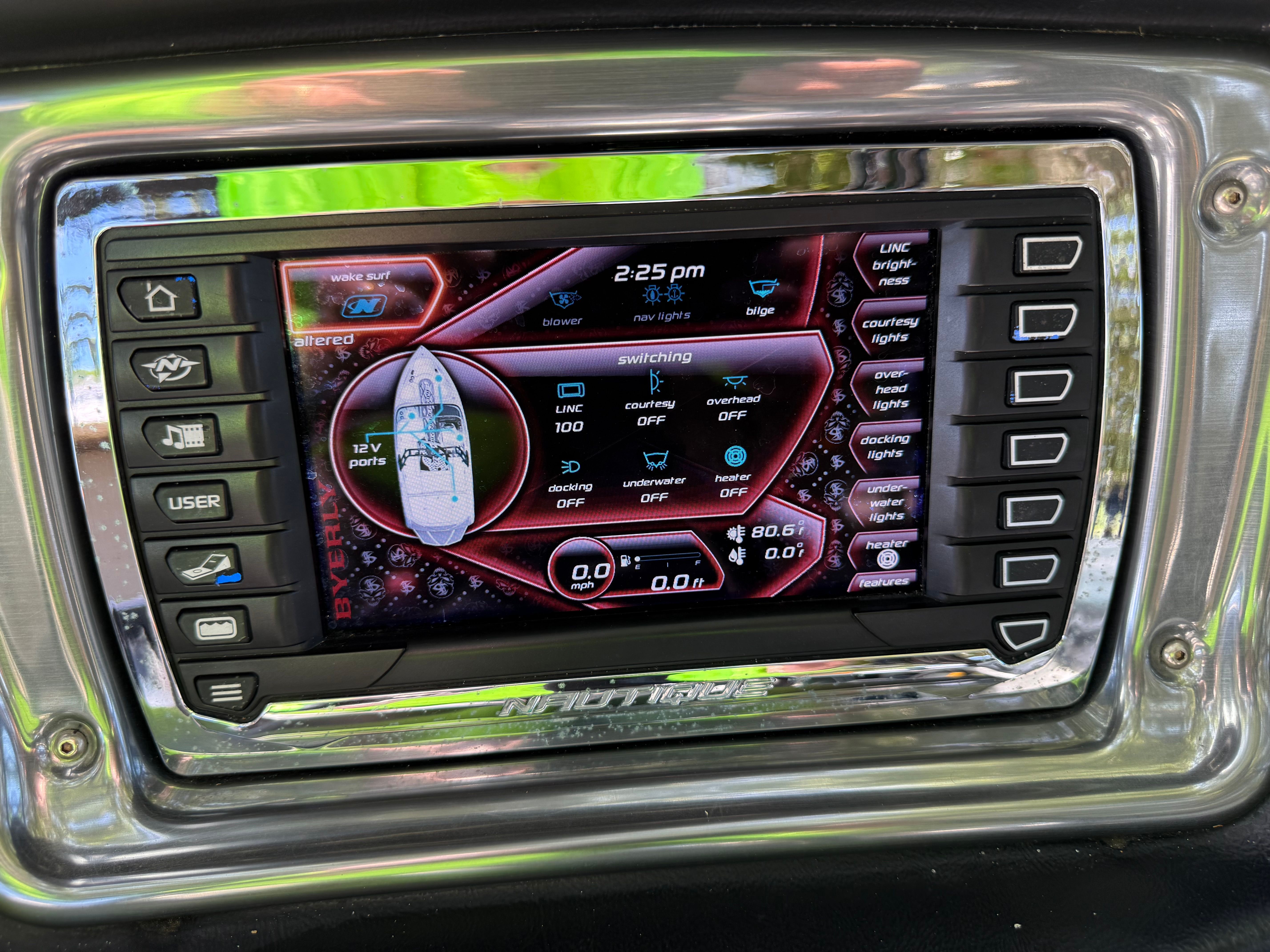 2012 Nautique Super Air Nautique 210 control panel with digital display.
