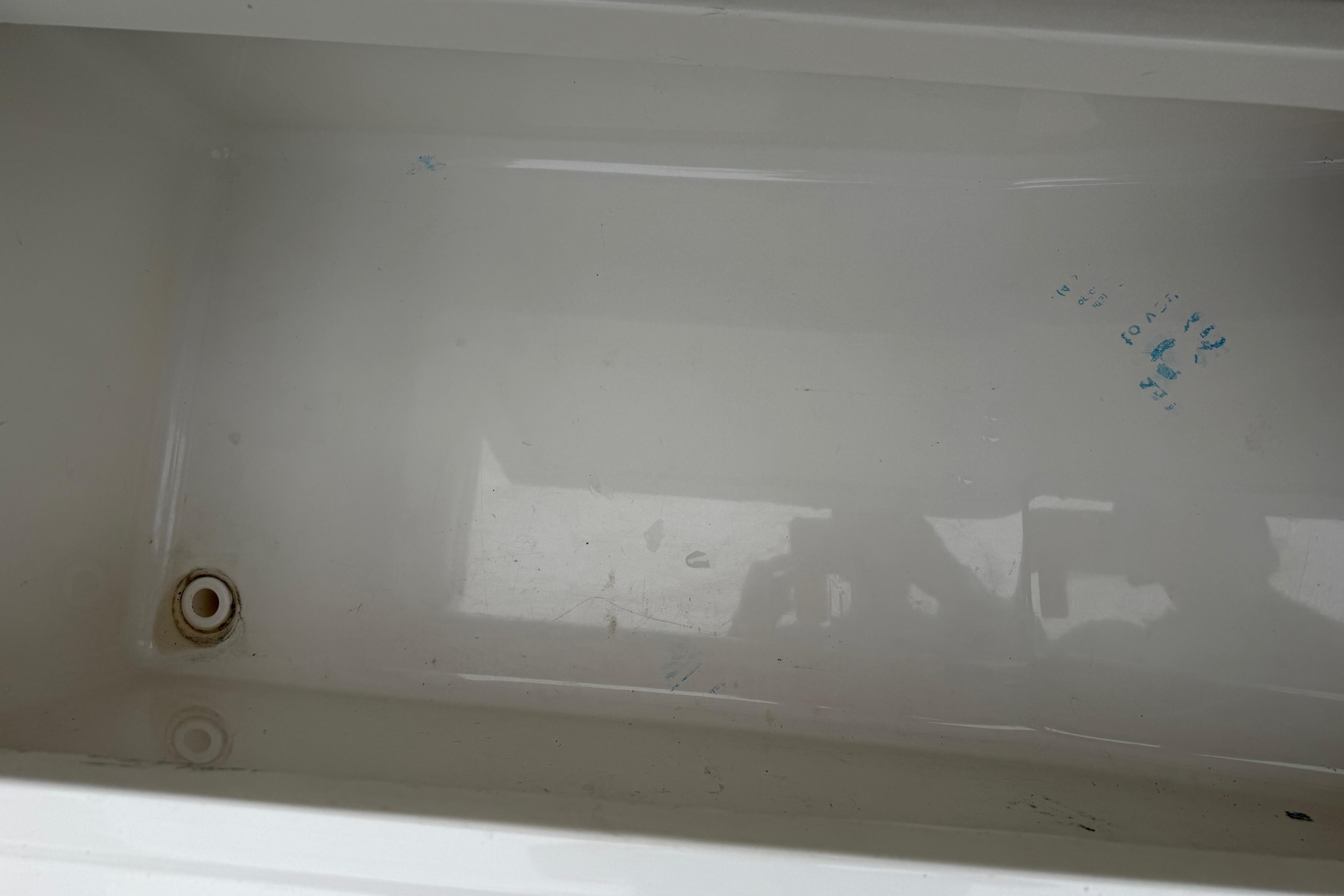 Clean white compartment interior of 2019 World Cat 230 DC boat.