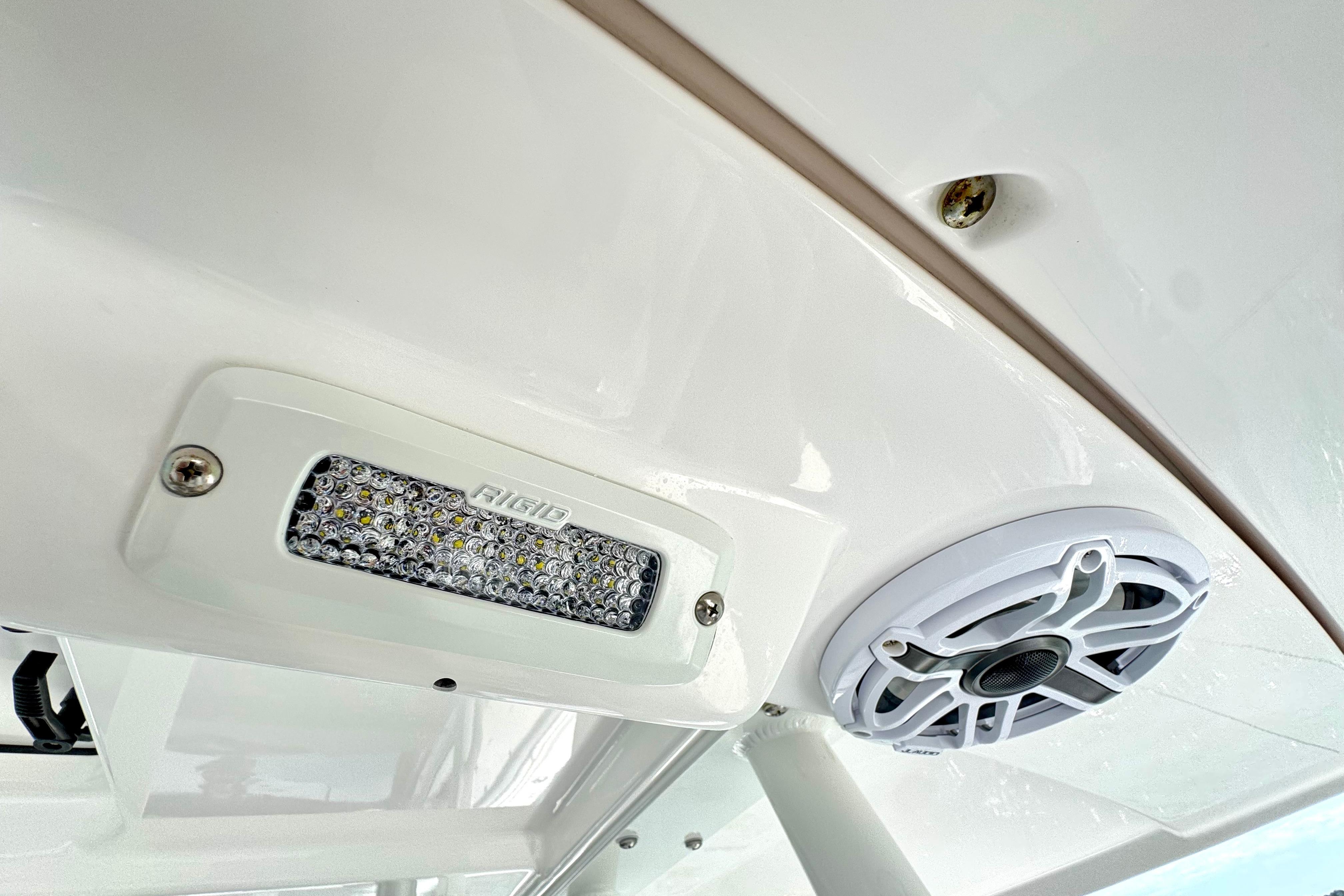LED light and speaker on 2023 Everglades 395 Center Console boat ceiling.
