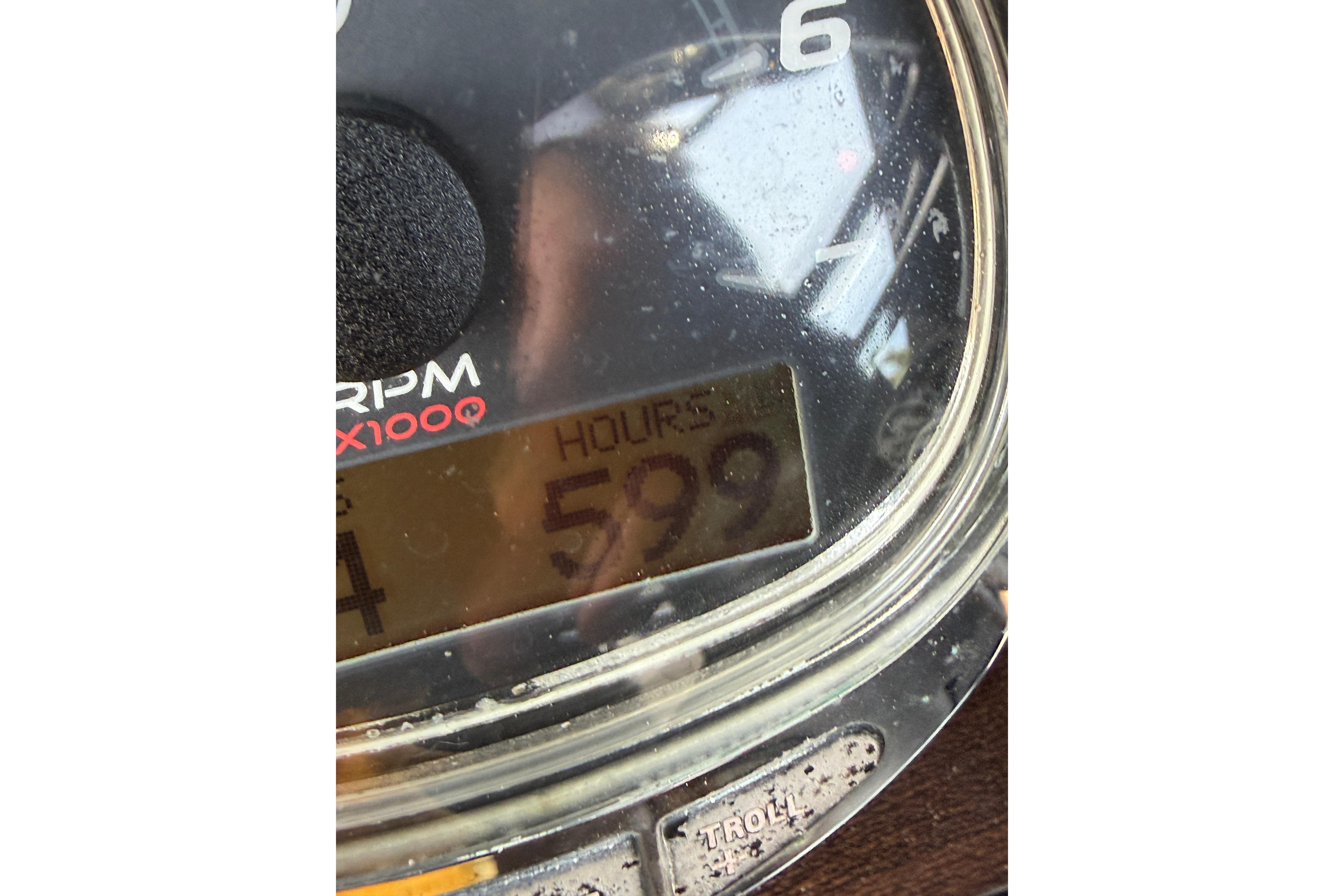 Close-up of Blackwood 27 tachometer showing 599 hours, 2015 model.