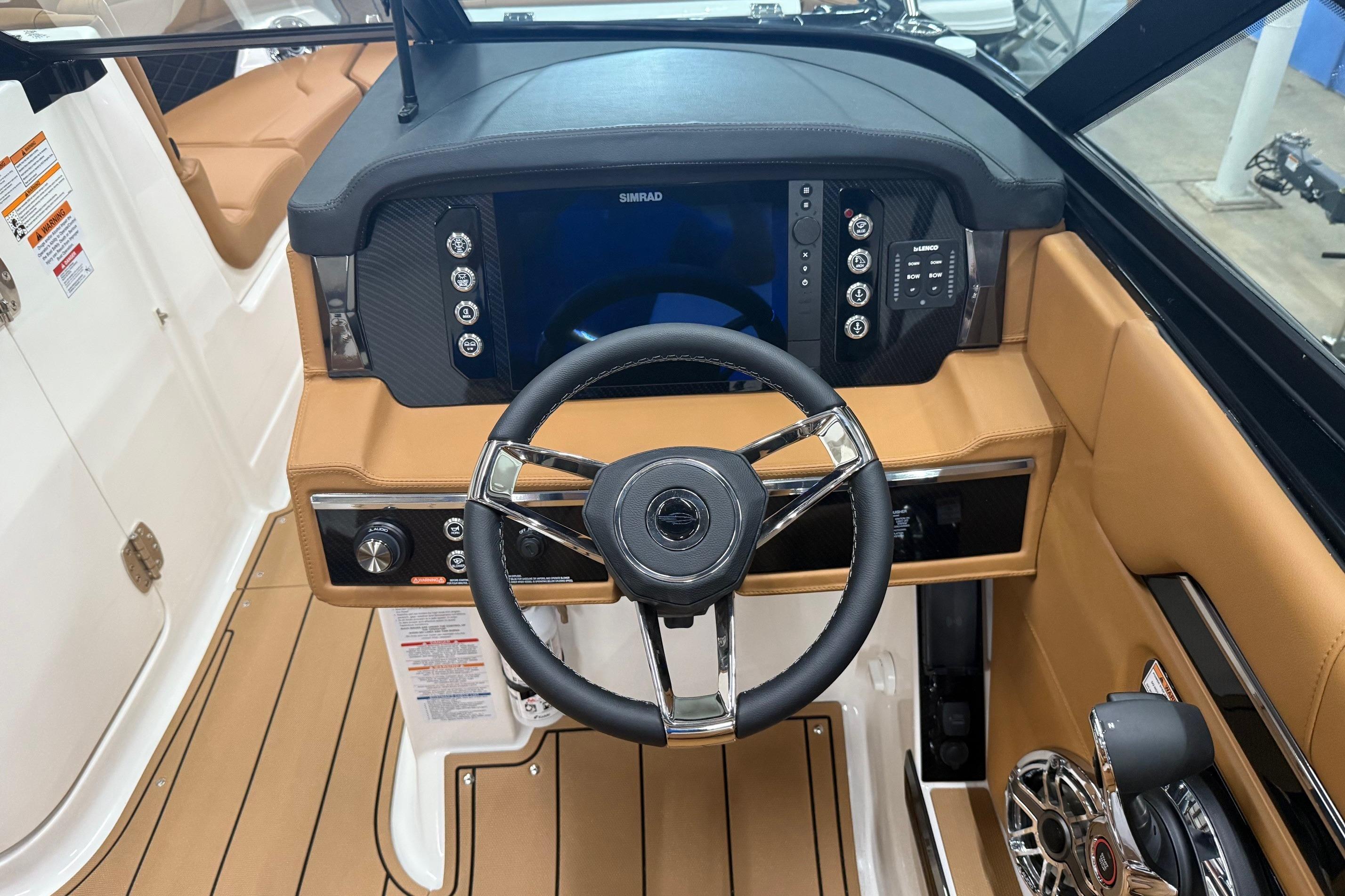 2026 Chaparral SSX 6 boat dashboard with steering wheel and advanced controls.