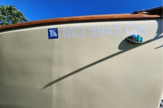 1985 Wasque Down East Cruiser with registration number MO 5945 GK, side view.