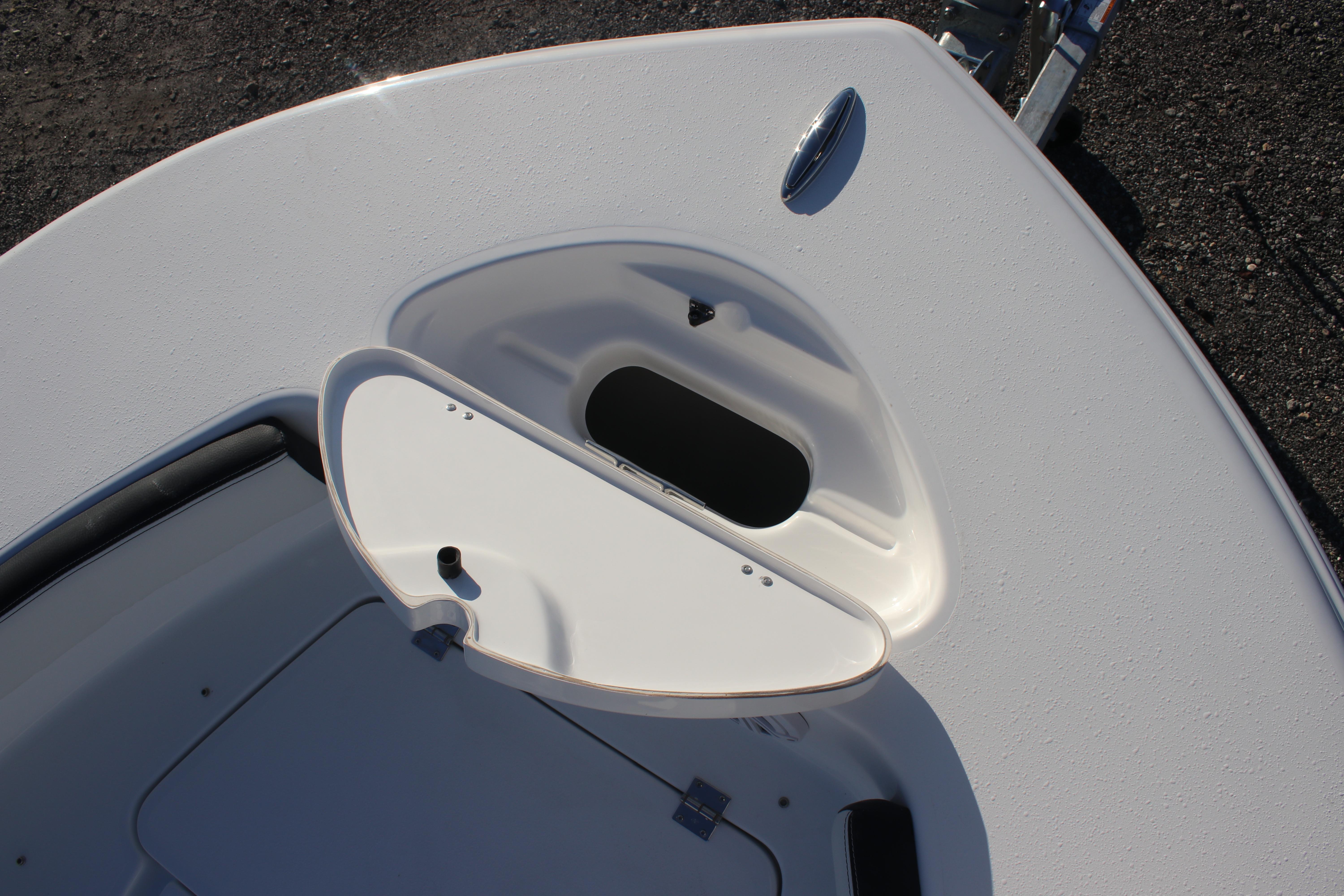 2026 Tidewater 180 CC Adventure boat with open storage compartment on deck.