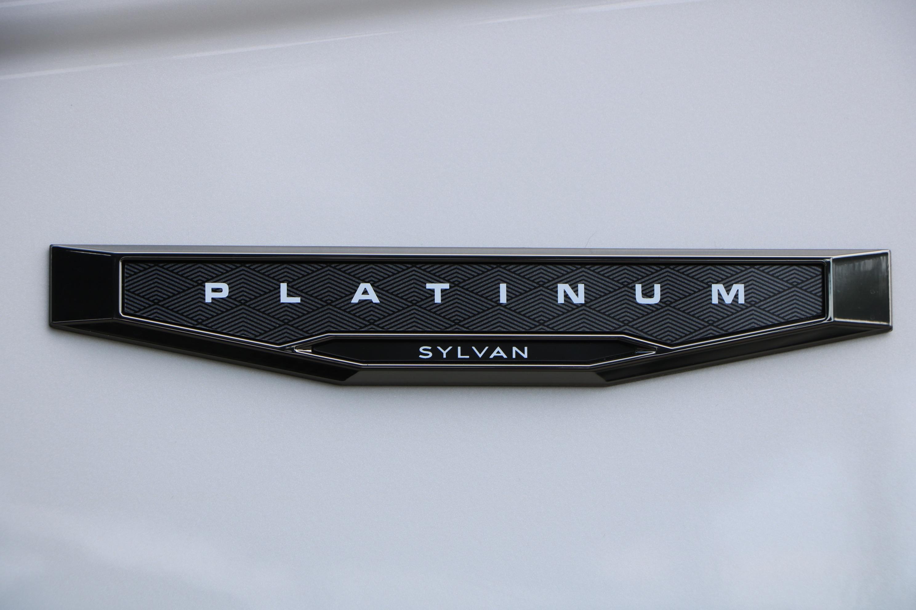 2026 Sylvan L3 DLZ Bar Platinum Edition Tri-Toon emblem on sleek black background.