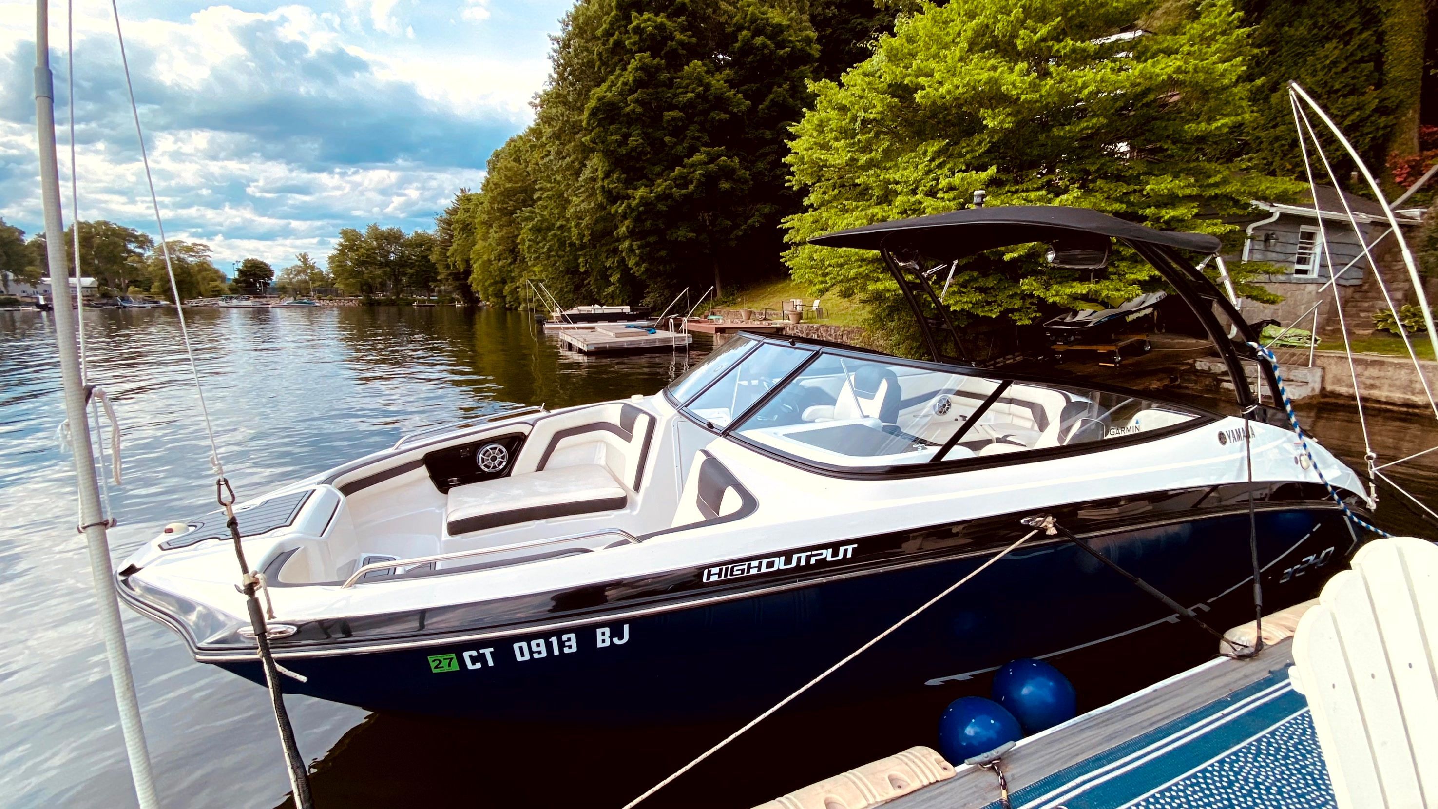 2016 Yamaha AR240 boat docked at lakeside.