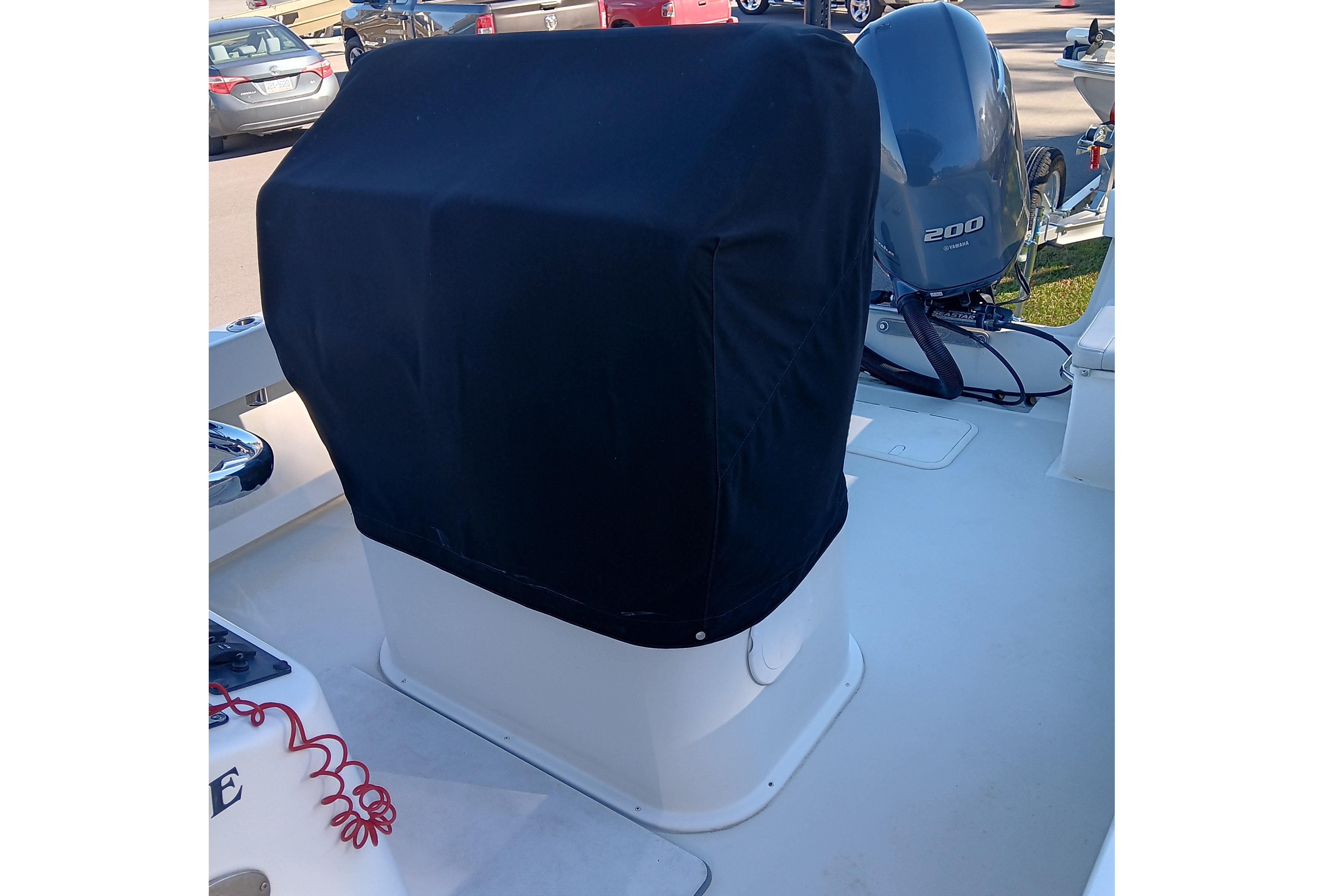 2016 Parker 2300 Special Edition boat with covered console and Yamaha 200 engine.