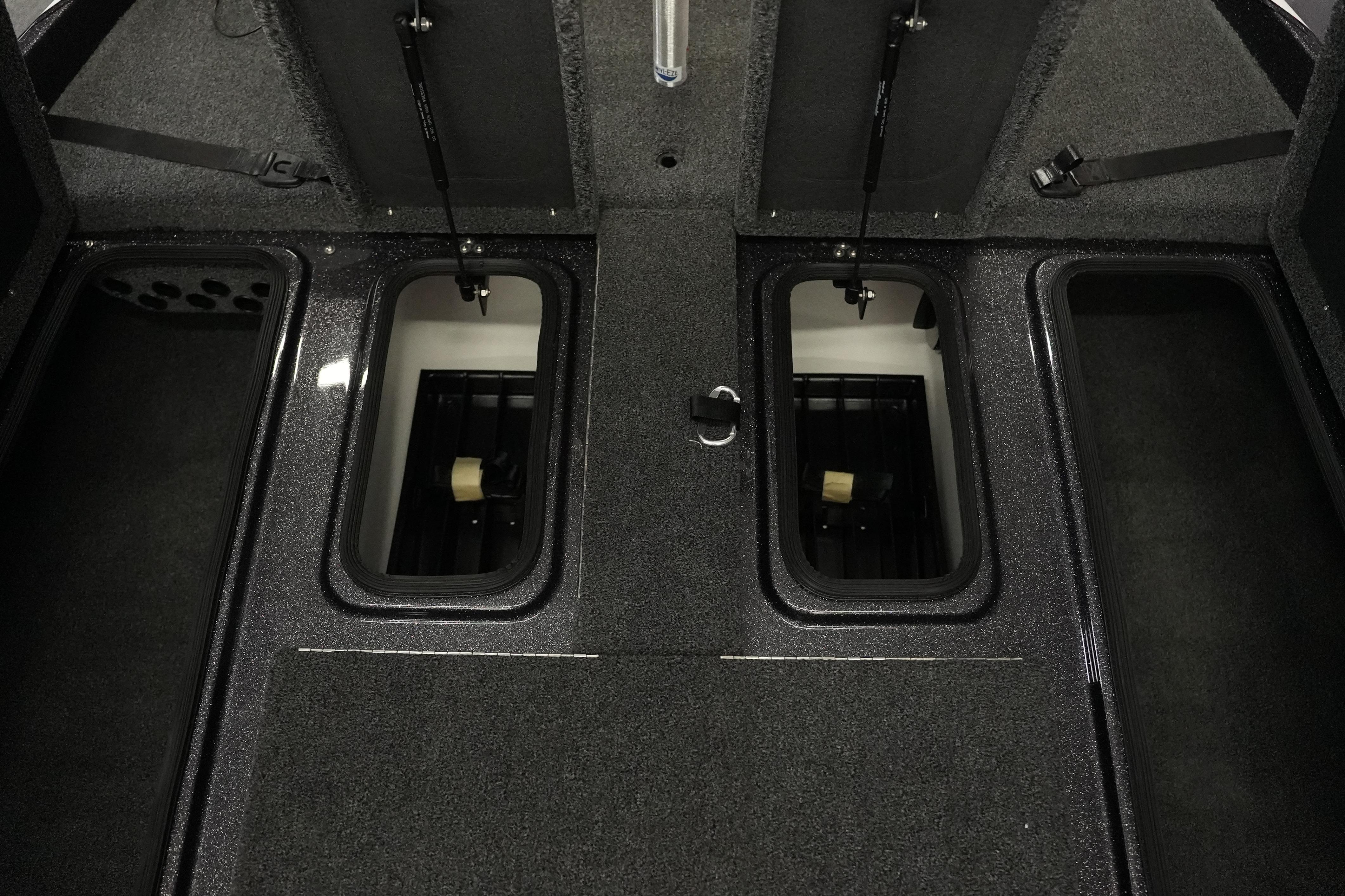 2026 Bass Cat Puma STS boat interior storage compartments, featuring sleek design and ample space.