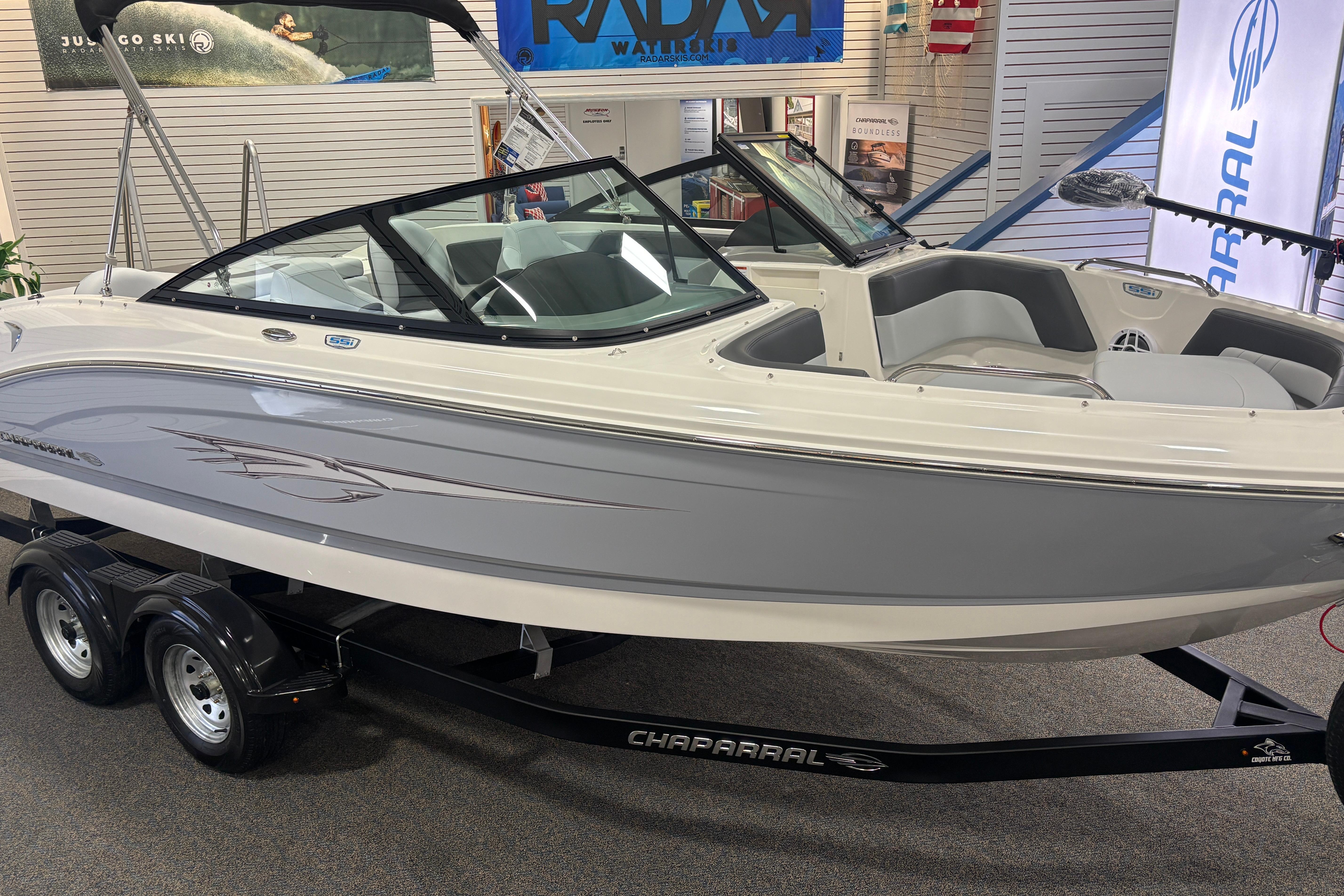 2026 Chaparral 21 SSi Ski & Fish boat in showroom.