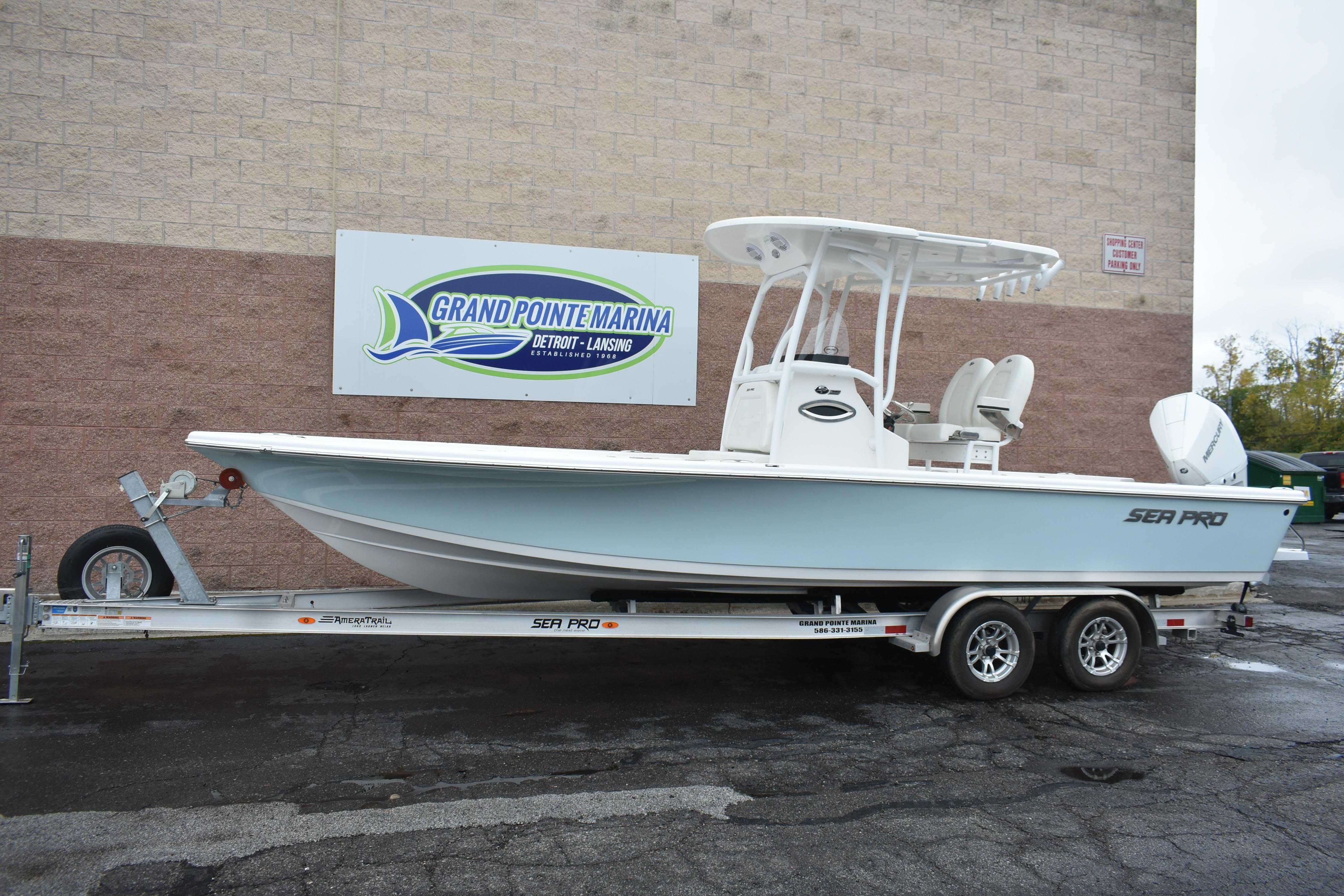 2025 Sea Pro 250 Bay boat on trailer at Grand Pointe Marina.