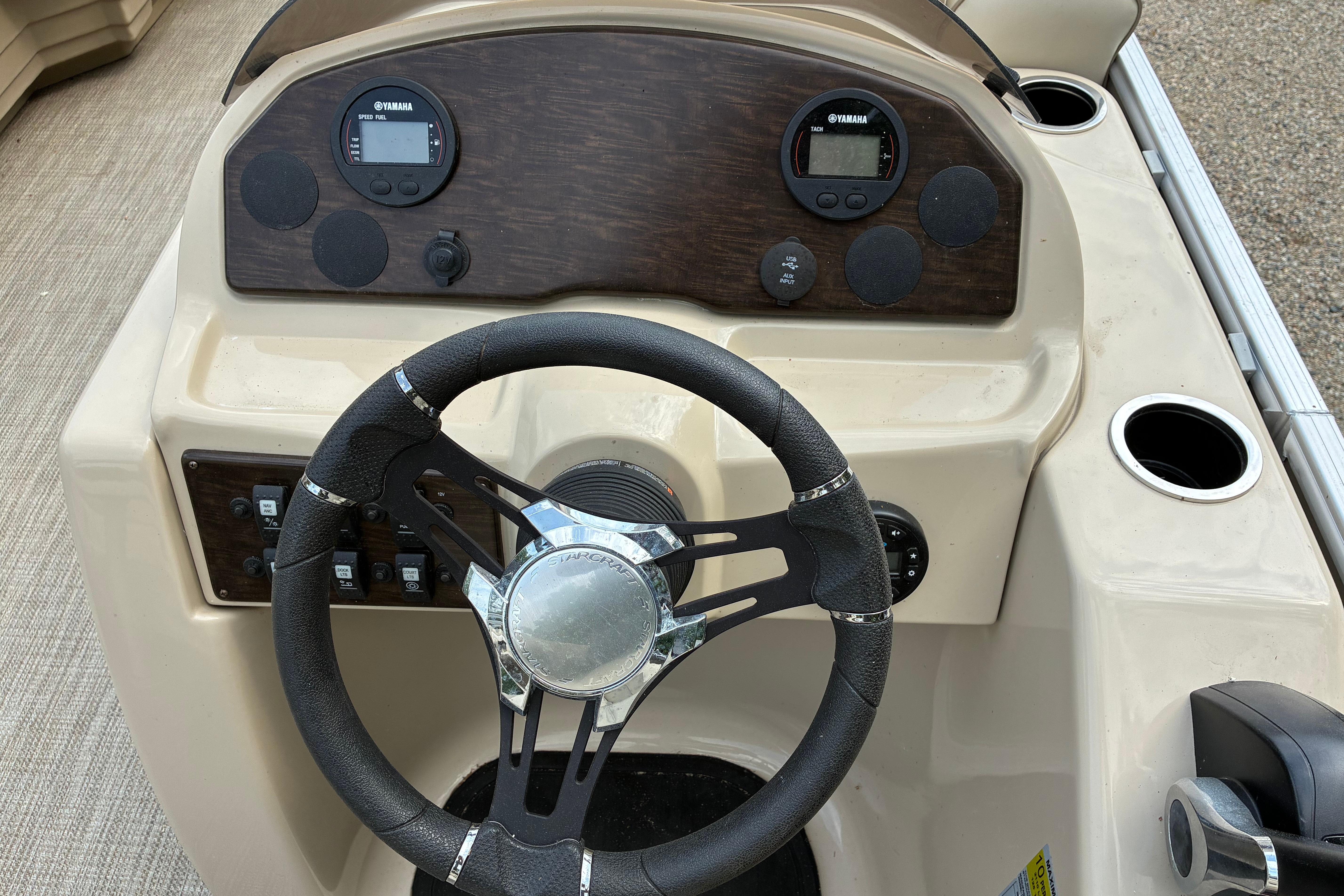 Steering console of 2020 Starcraft EX 20 C boat with Yamaha gauges.
