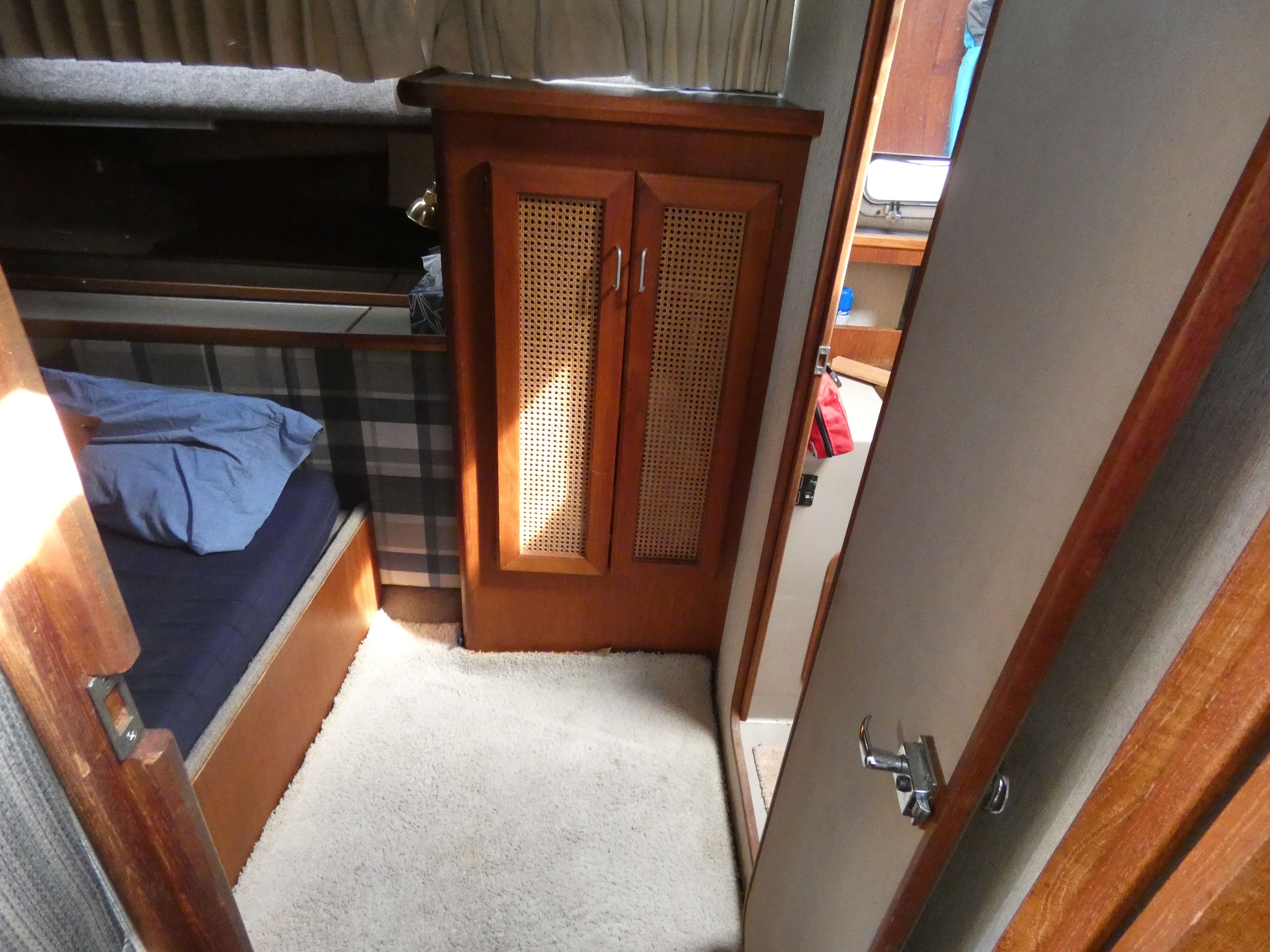 Interior of 1984 Bayliner 3870 Motoryacht with wooden furnishings.
