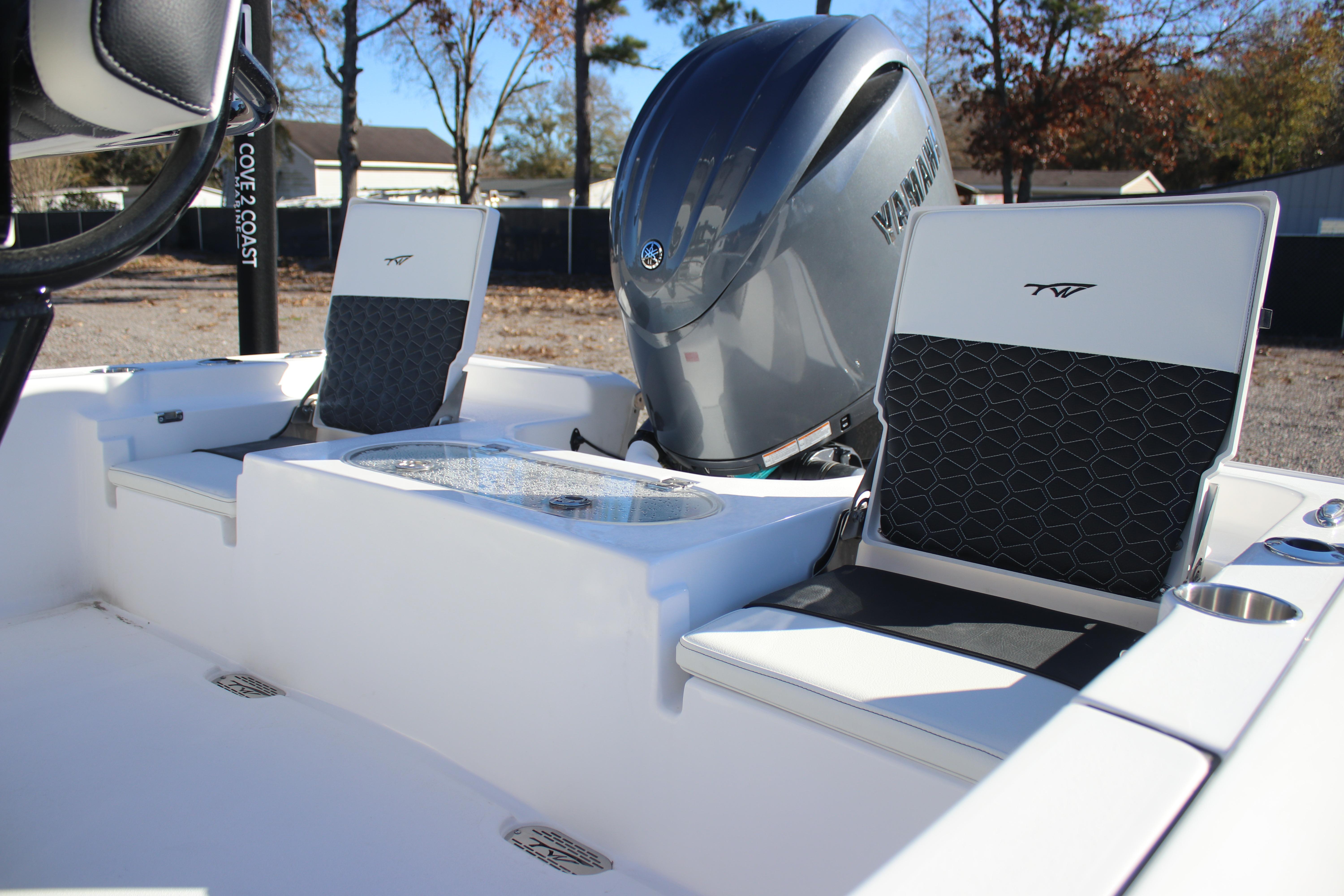 2026 Tidewater 2210 Carolina Bay boat interior with Yamaha engine and seating.