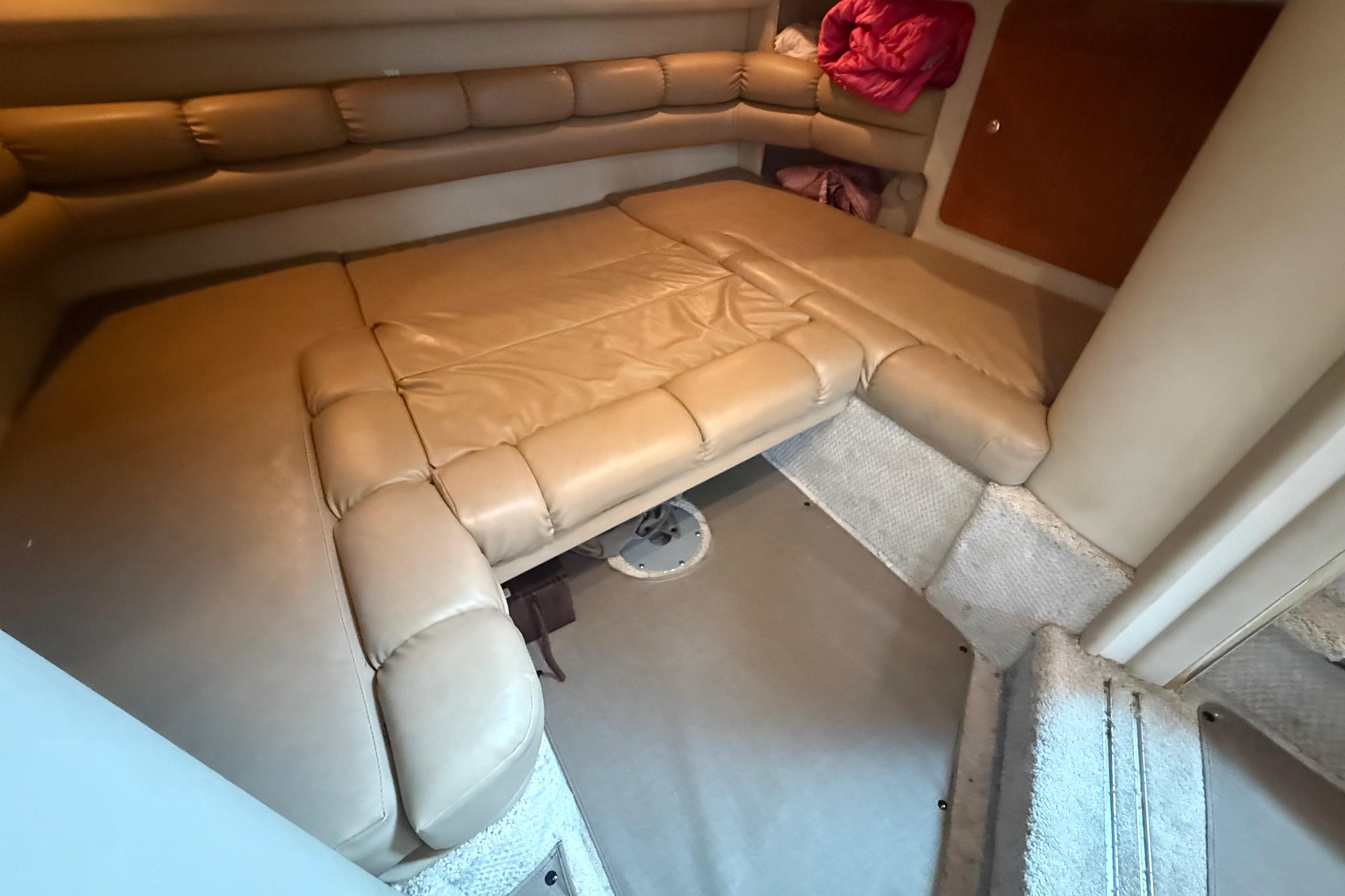 Interior cabin of 1998 Sea Ray Sundancer 400 with beige leather seating.