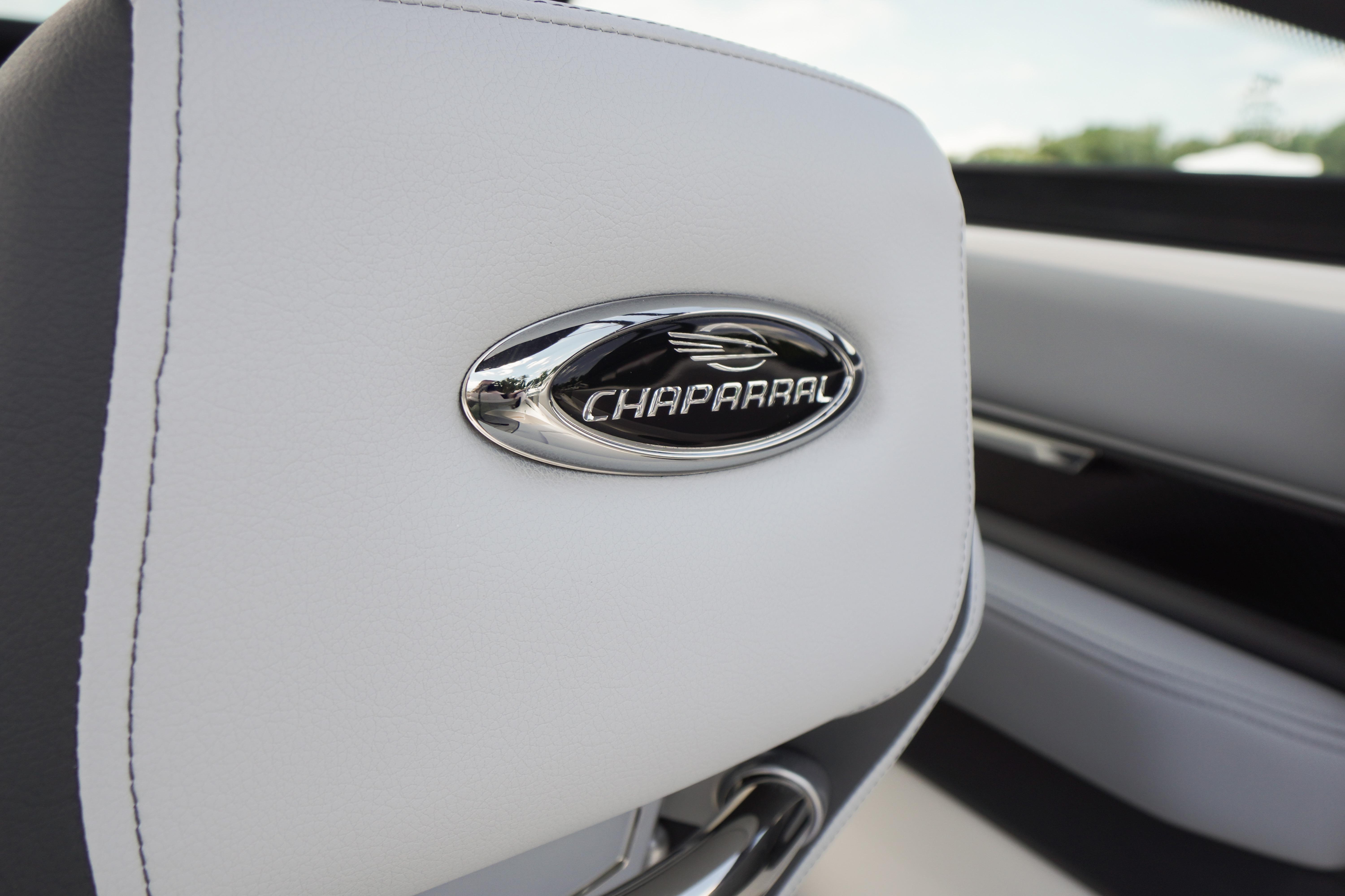 2026 Chaparral SSX 4 interior with logo on white upholstery.